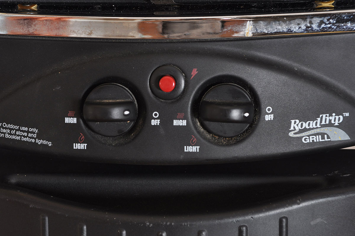 Coleman "Road Trip" Propane Grill with Folding Stand and Wheeled Carrying Case