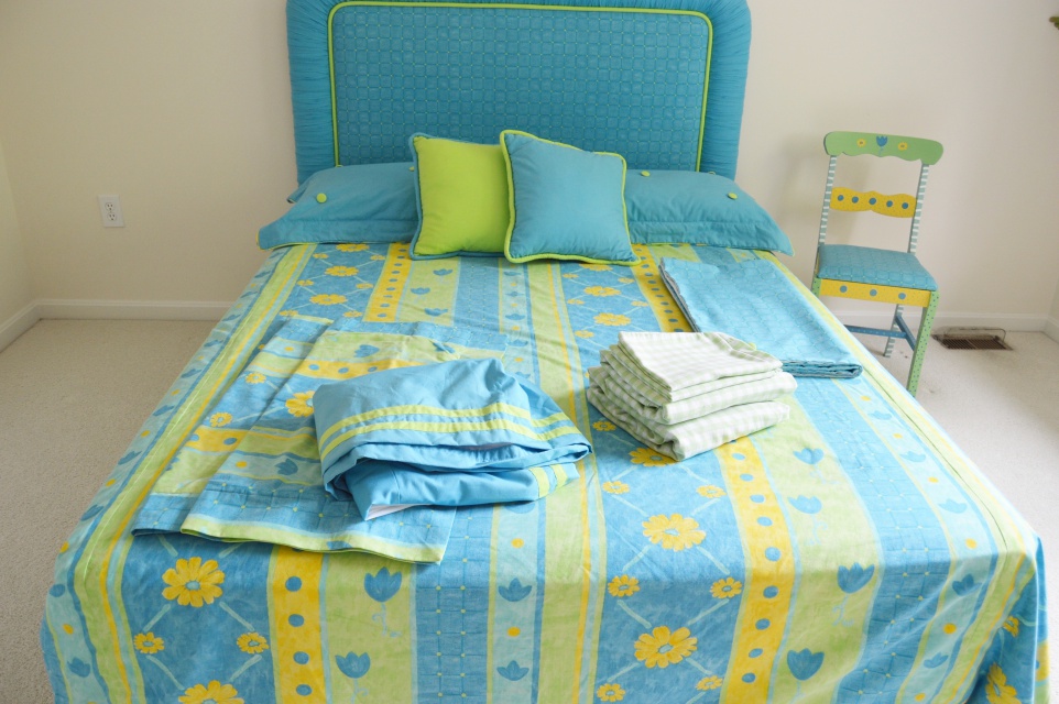 Twin Size Bed, Bedding Ensemble and Chair