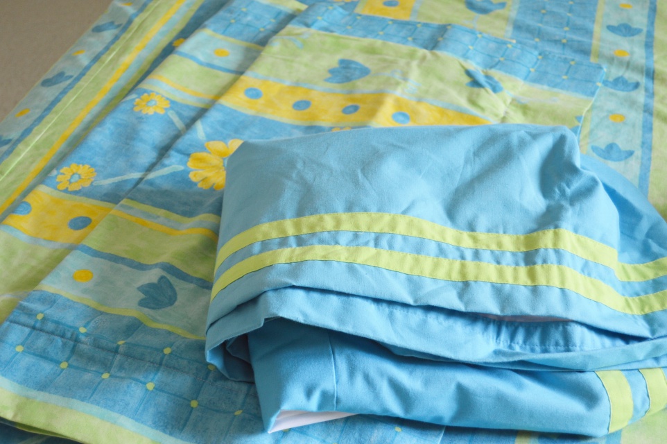 Twin Size Bed, Bedding Ensemble and Chair