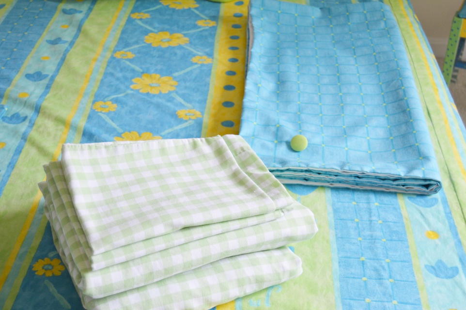 Twin Size Bed, Bedding Ensemble and Chair