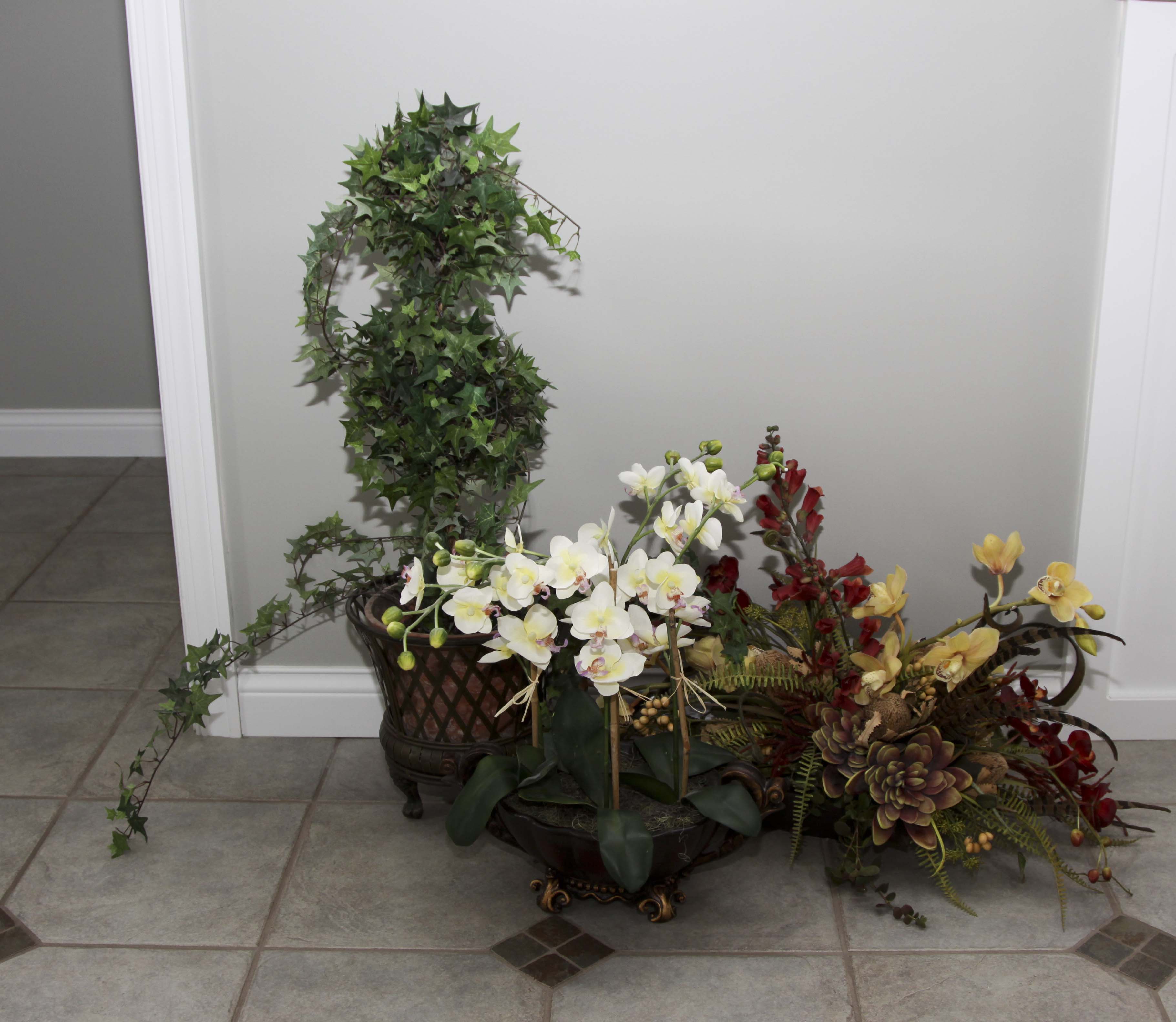 Faux Floral Decor including a Topiary and Centerpiece