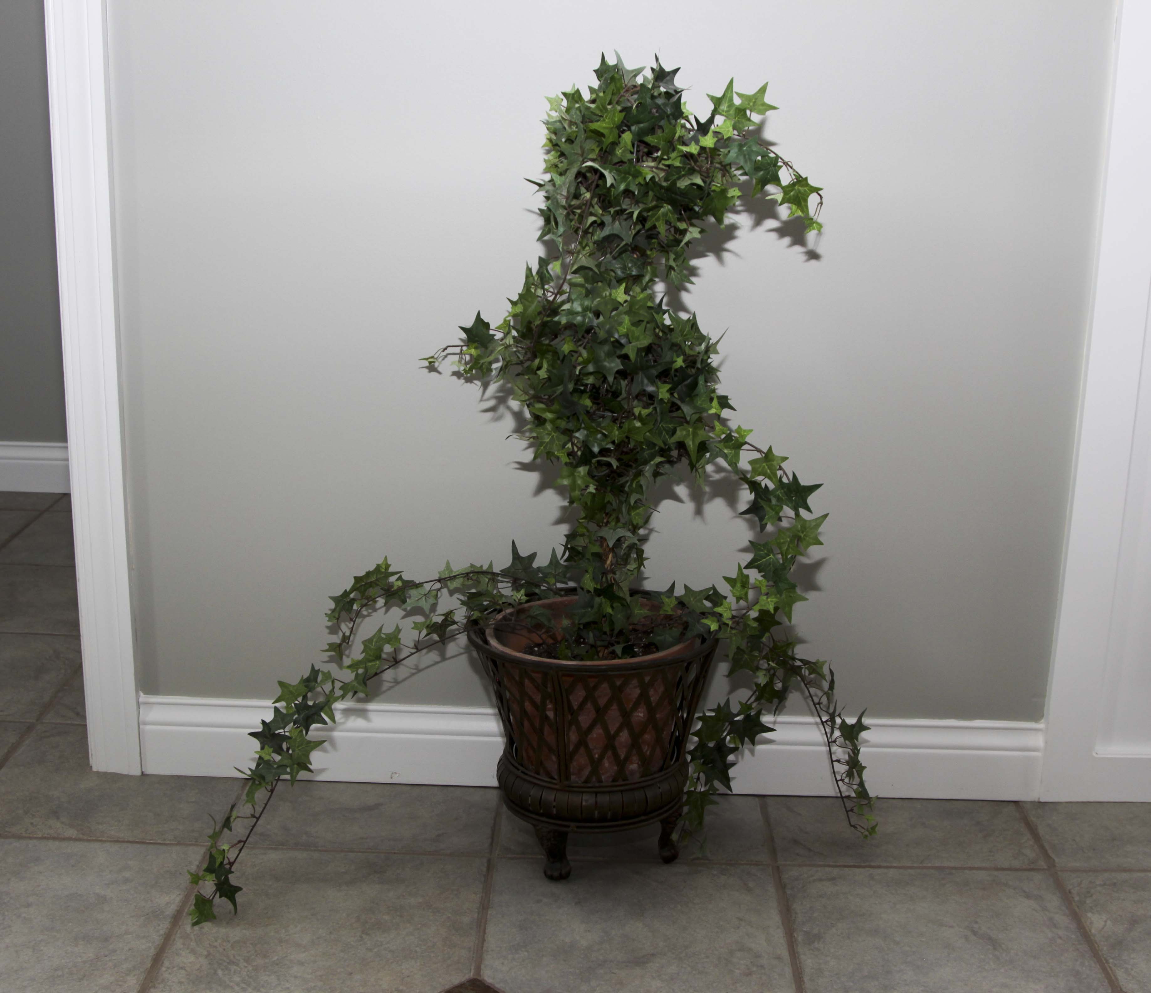 Faux Floral Decor including a Topiary and Centerpiece