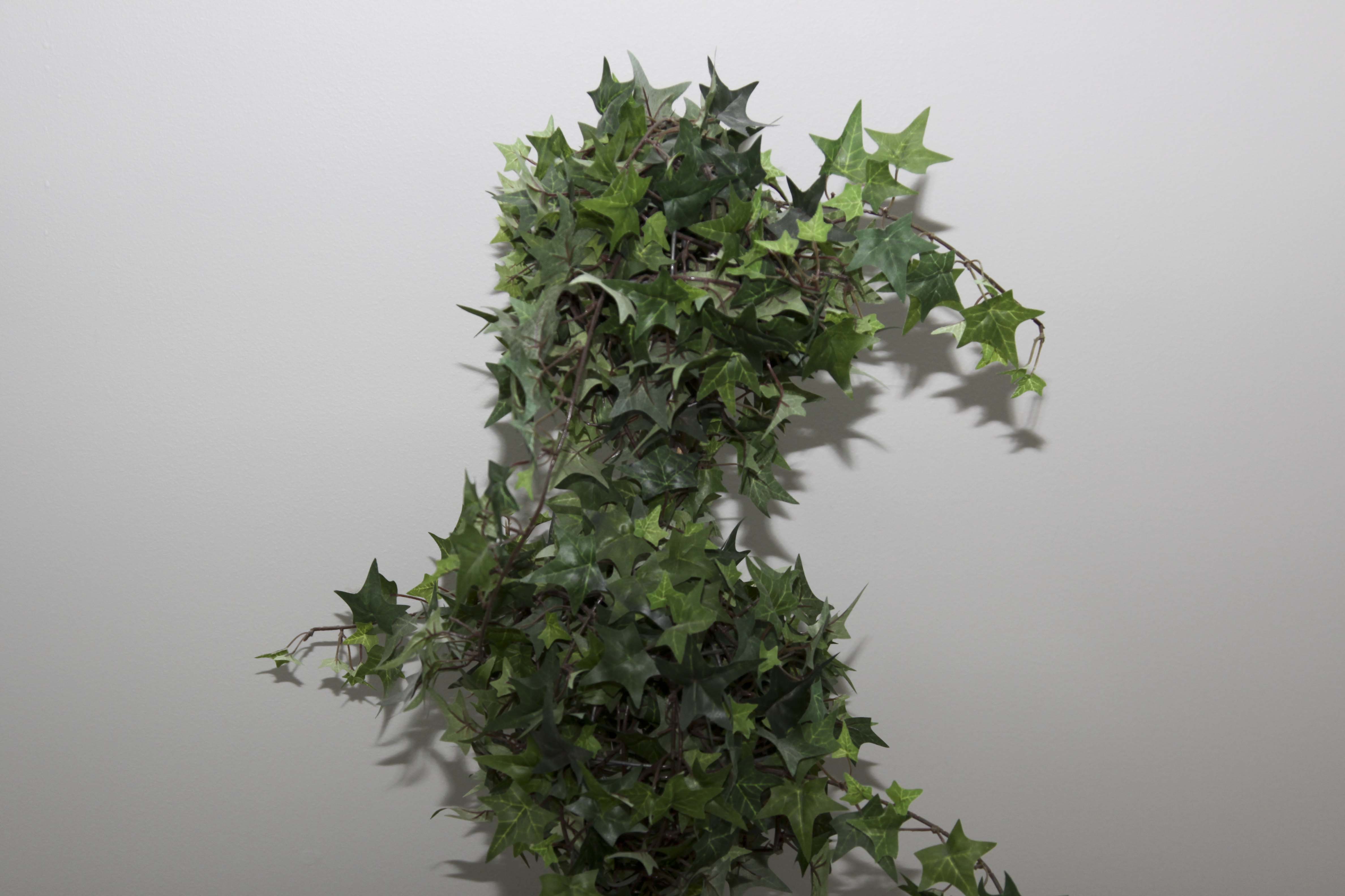 Faux Floral Decor including a Topiary and Centerpiece