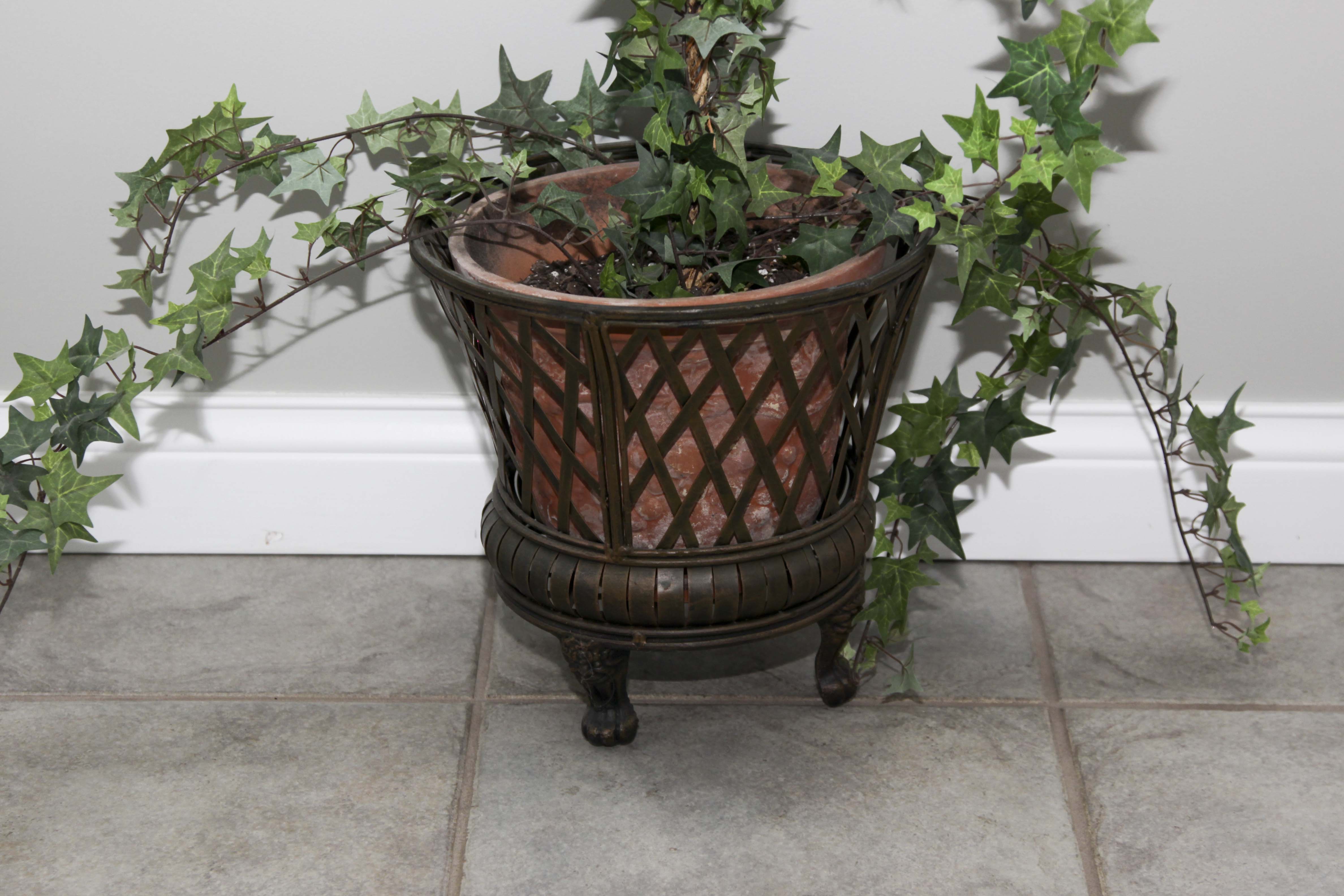 Faux Floral Decor including a Topiary and Centerpiece