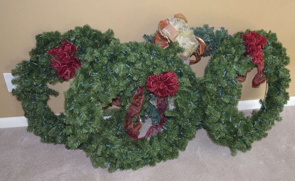 Four Faux Pine Decorative Wreaths