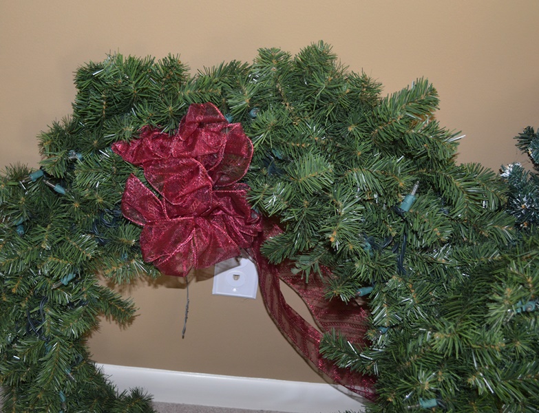 Four Faux Pine Decorative Wreaths