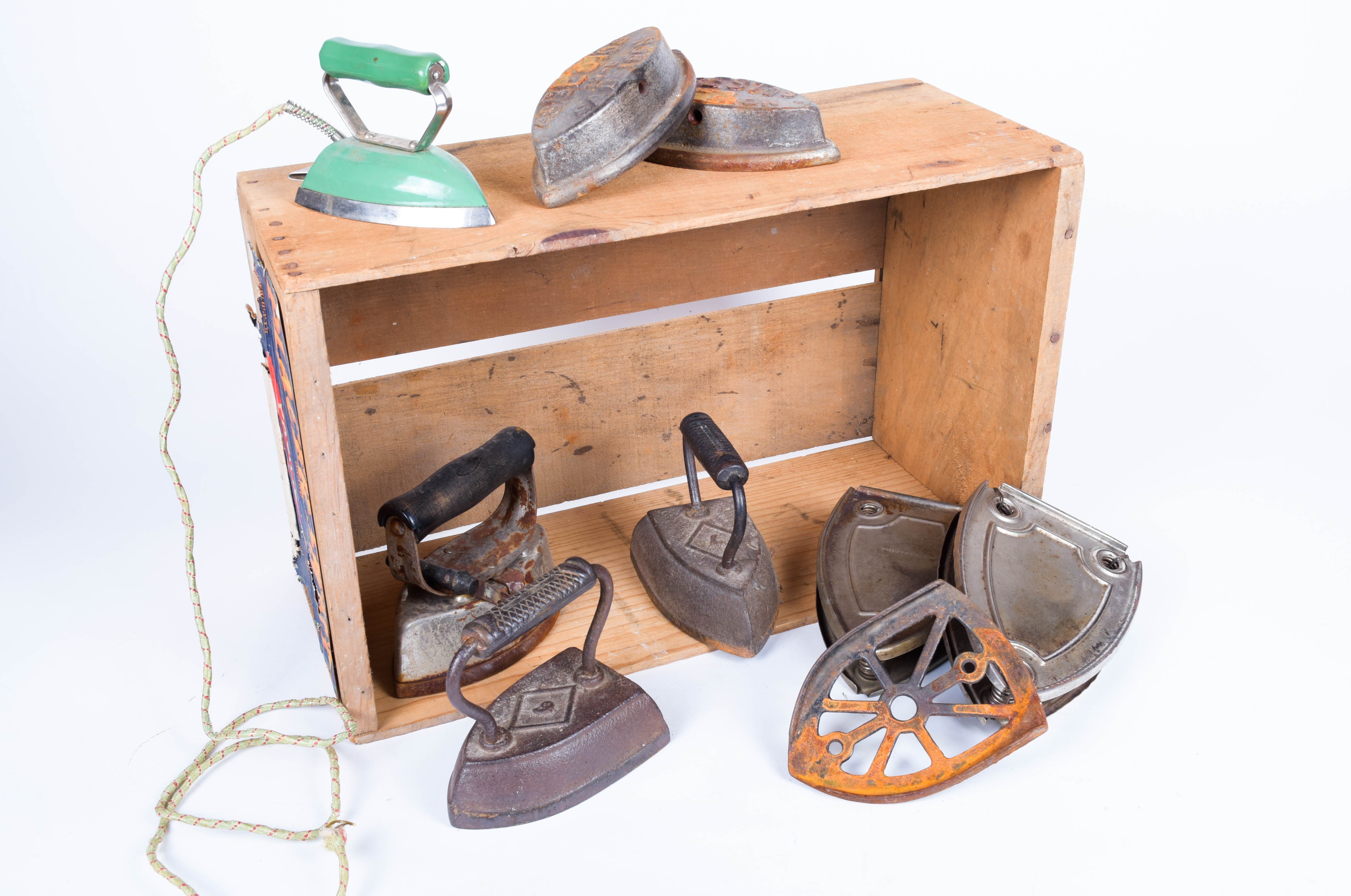 Sad Iron Collection in a Vintage Fruit Crate