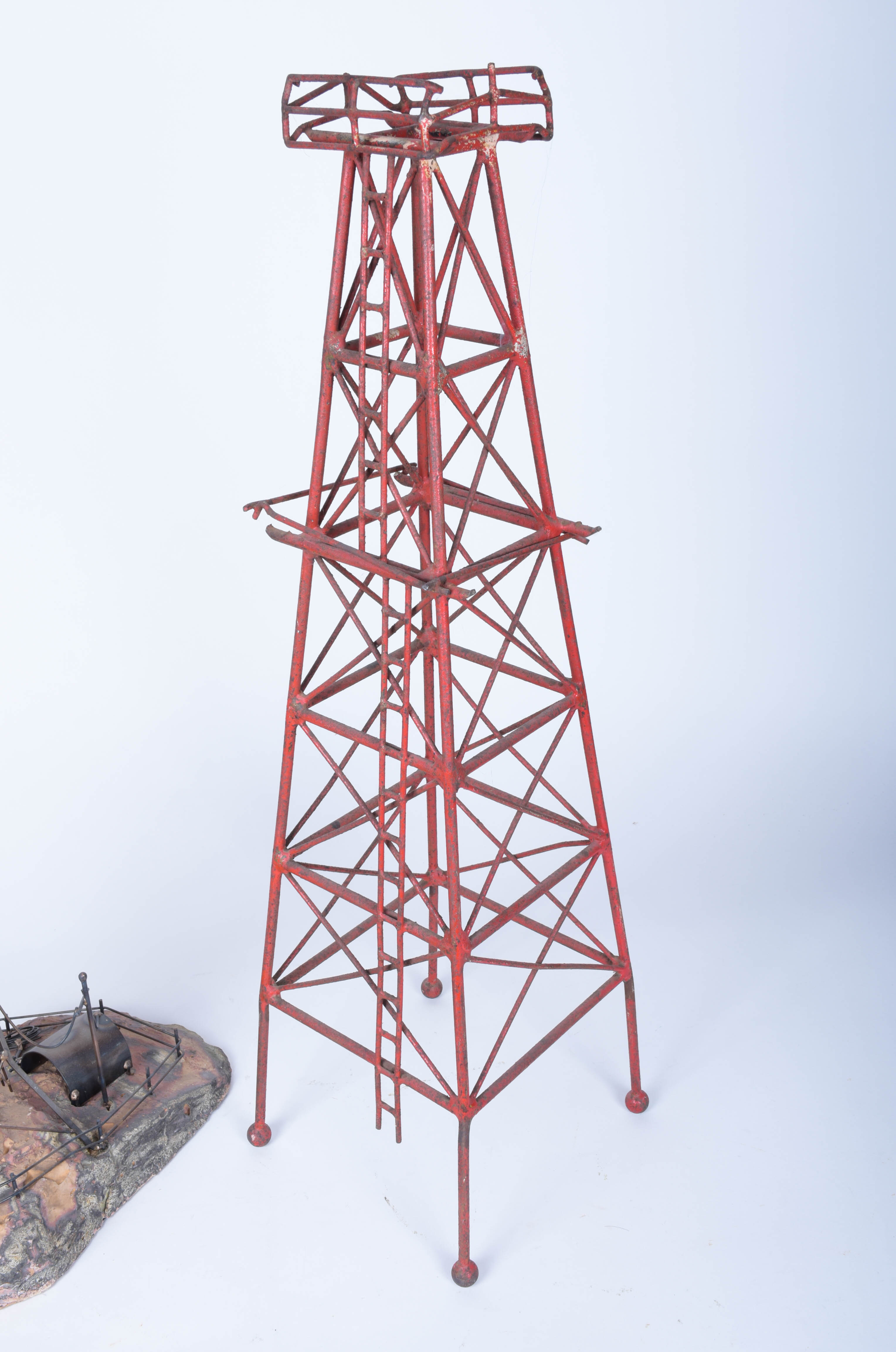 Two Oil Derrick Sculptures
