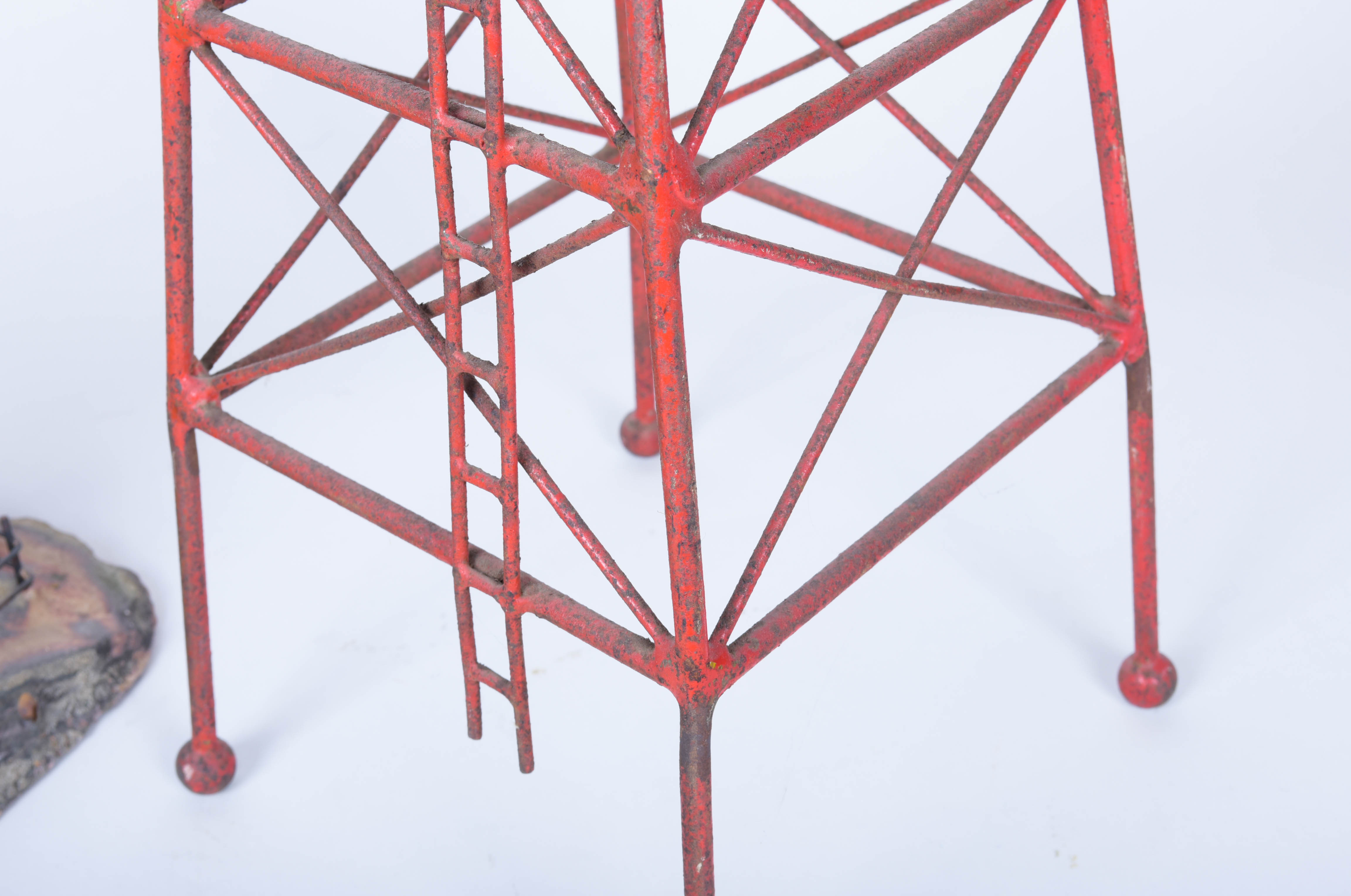 Two Oil Derrick Sculptures