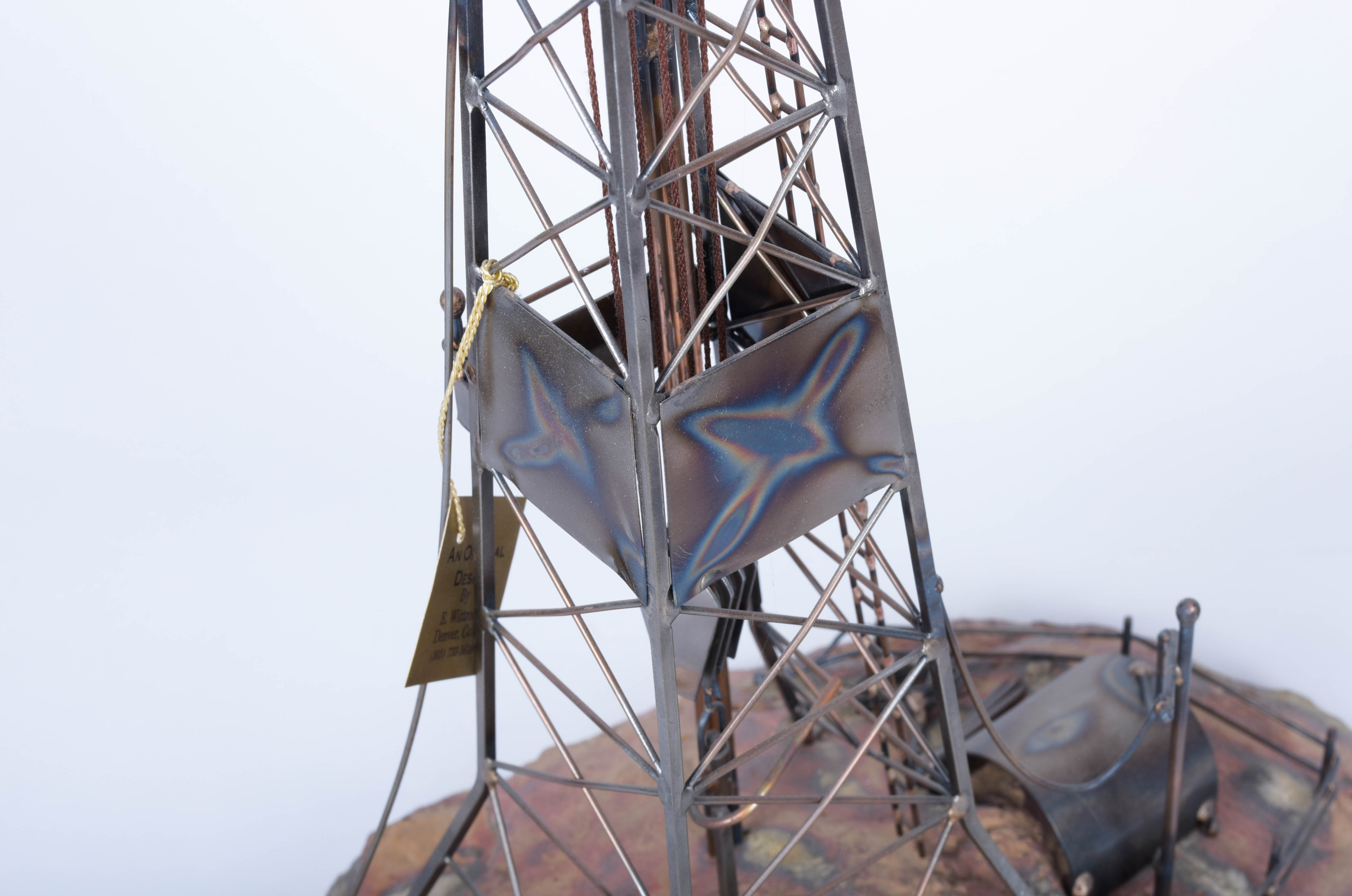 Two Oil Derrick Sculptures