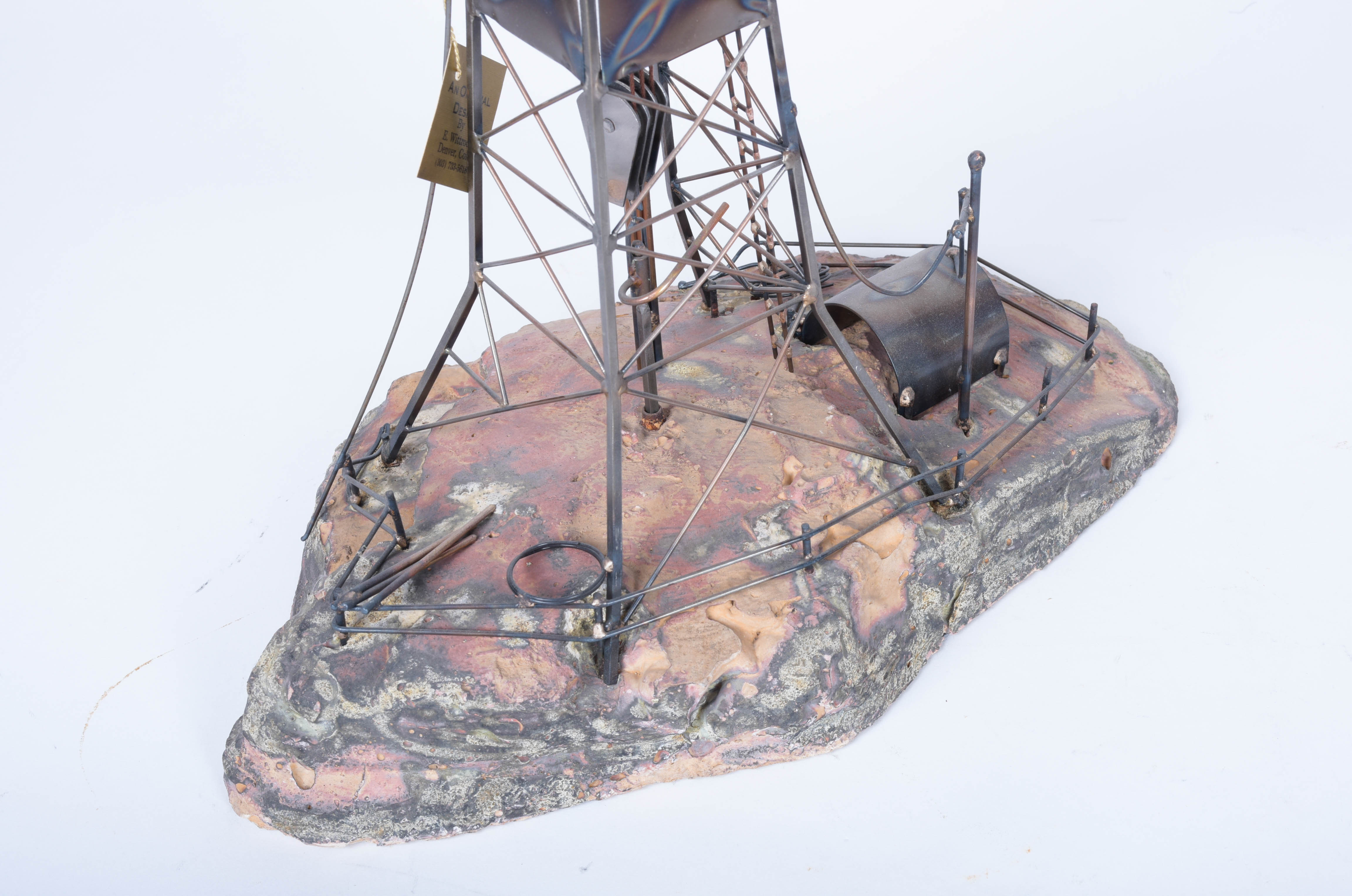 Two Oil Derrick Sculptures