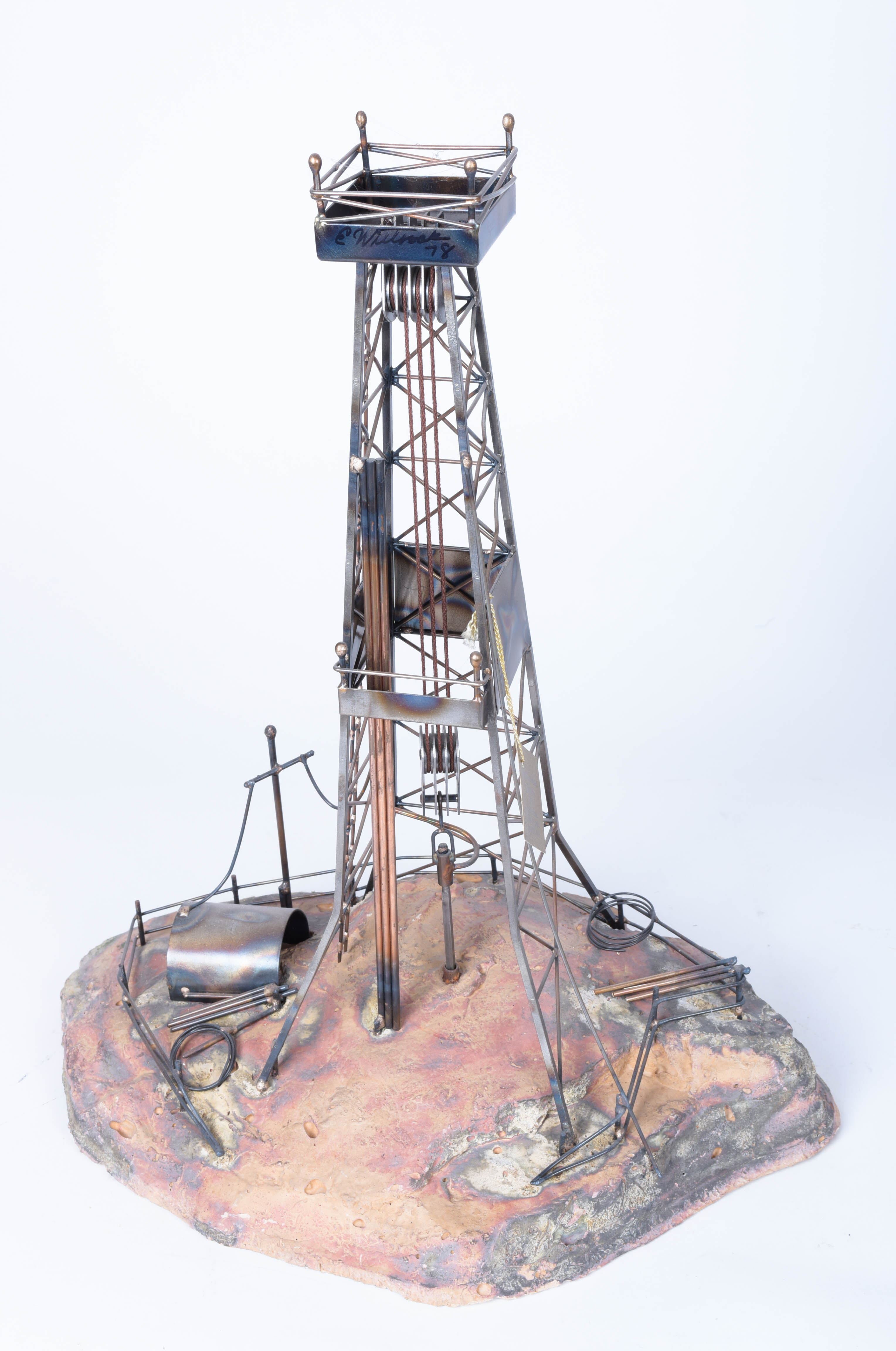 Two Oil Derrick Sculptures