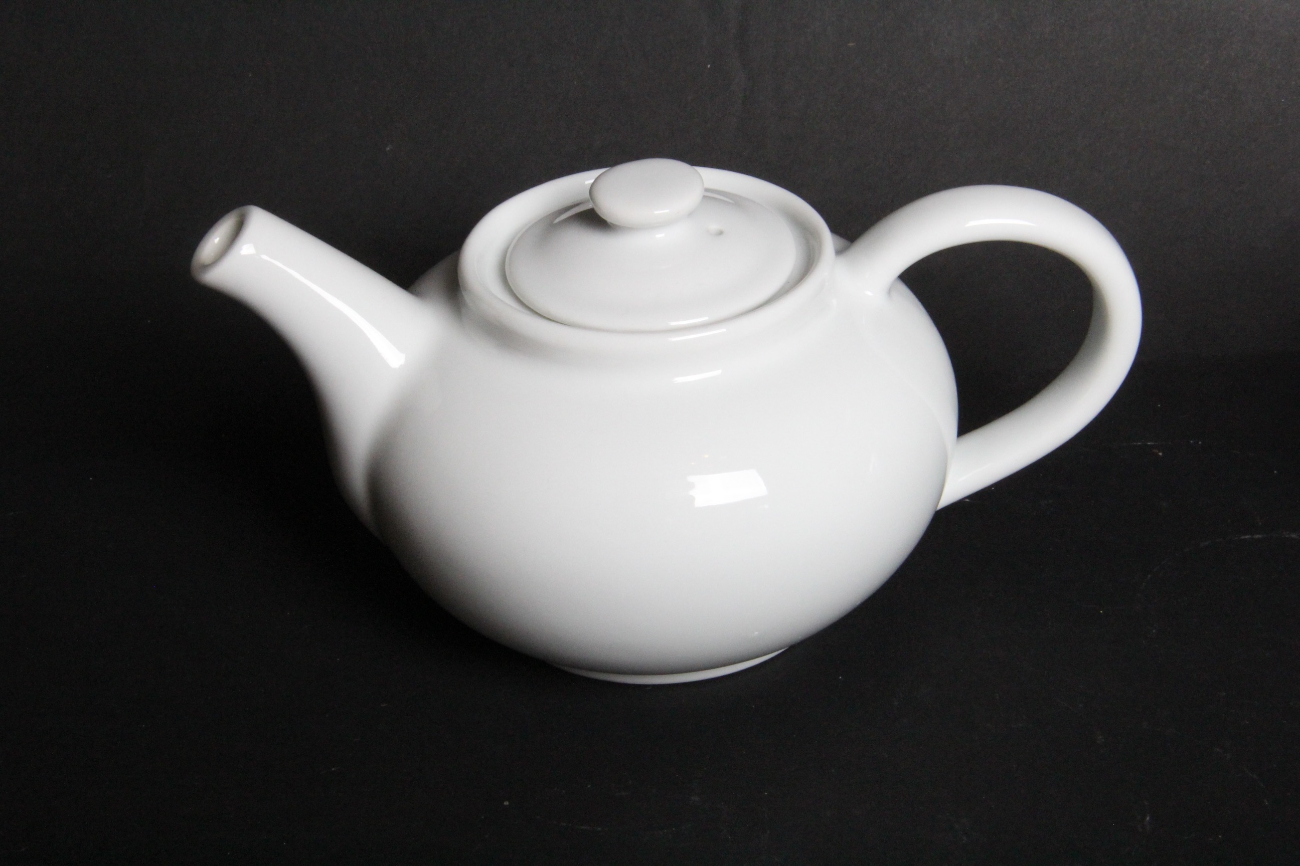 Pair of Modern Porcelain Teapots and Accessories