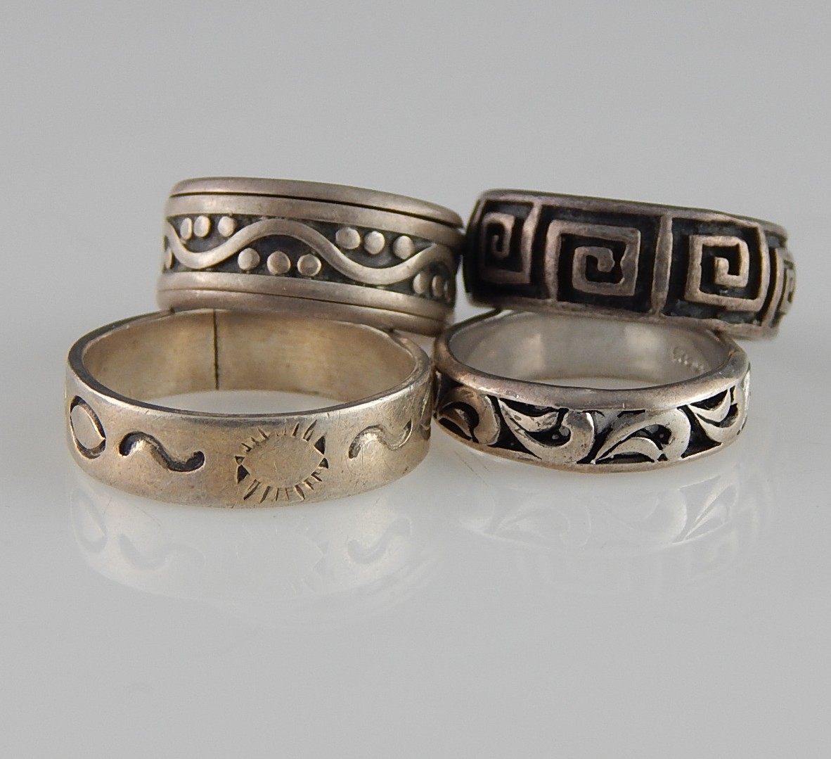 Four Sterling Silver Bands