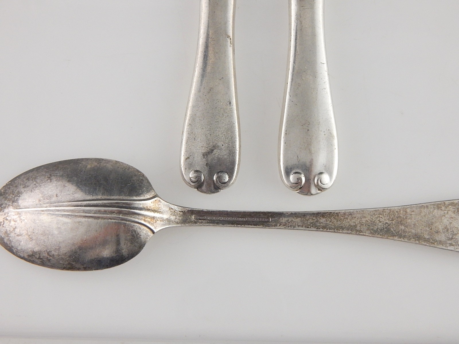 Tiffany & Co. Sterling Silver Butter Spreaders and a Place Spoon