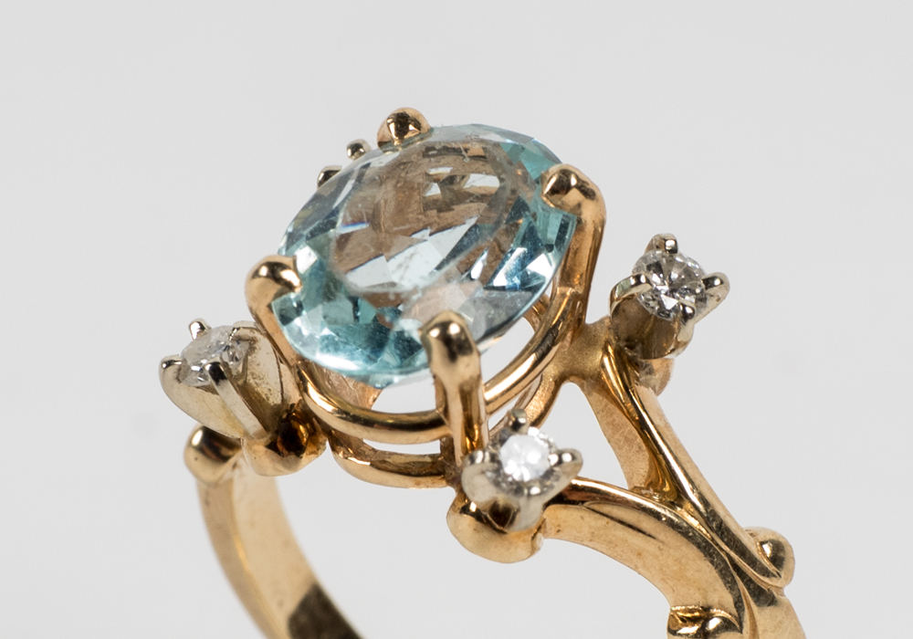 14 Karat Gold 1.54 CT Oval Cut Aquamarine and Diamond Ring