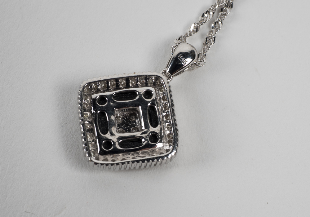 14 Karat White Gold Onyx and Diamond Pendant and Necklace