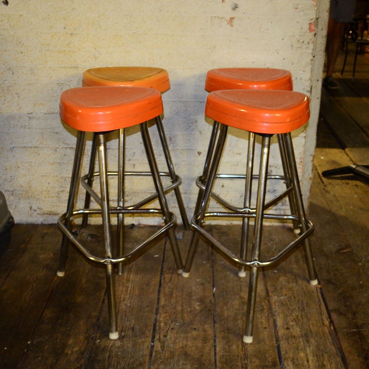 Circa 1950s Retro Snyder Orange Plastic and Chrome Bar Stools