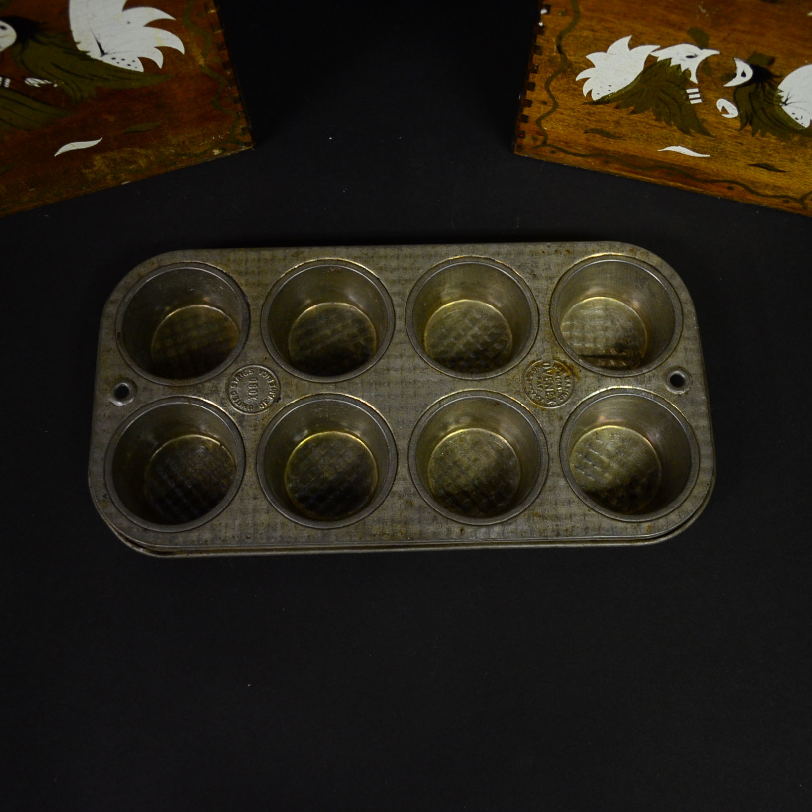 Collection of Wooden Canisters and Vintage Tin Bakeware
