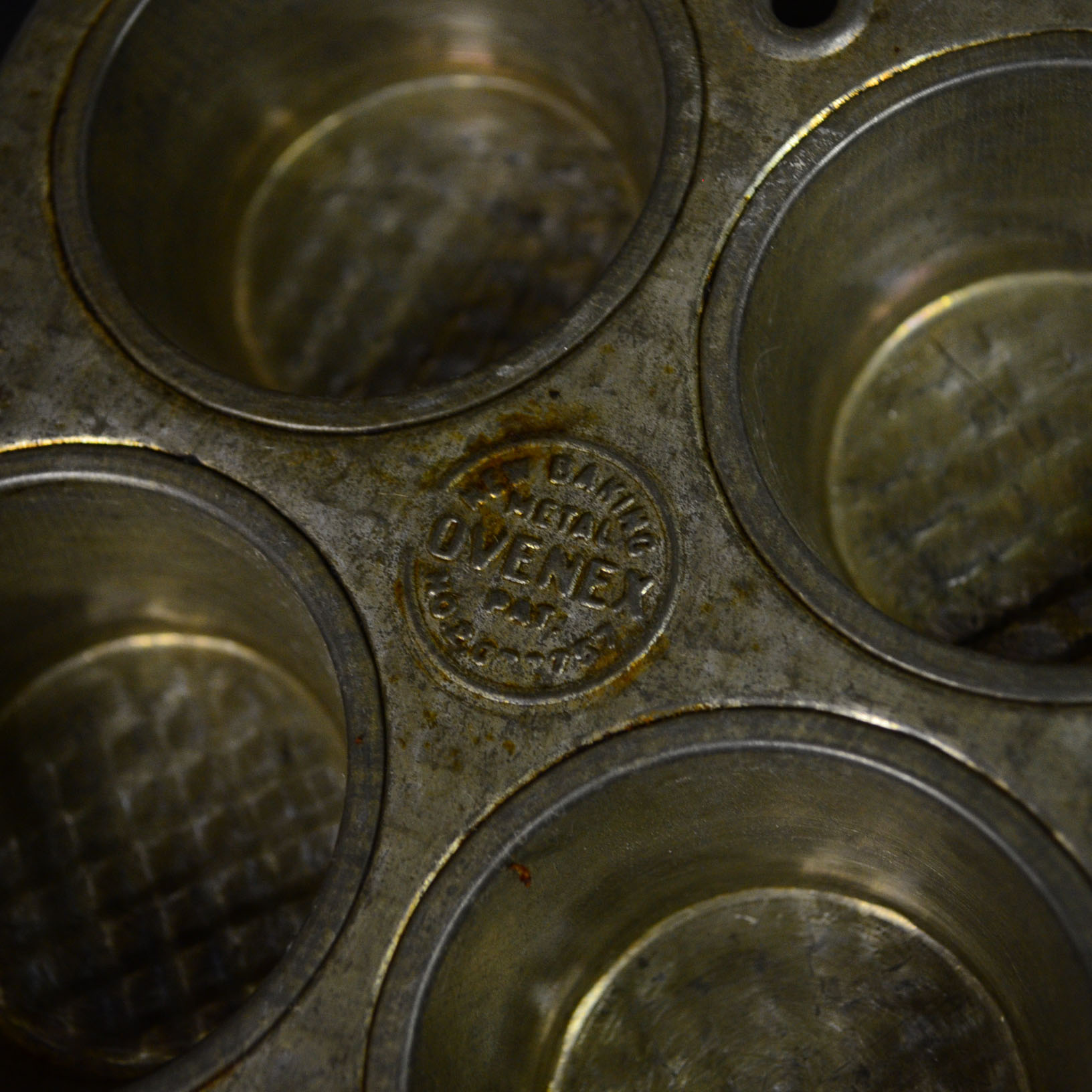 Collection of Wooden Canisters and Vintage Tin Bakeware
