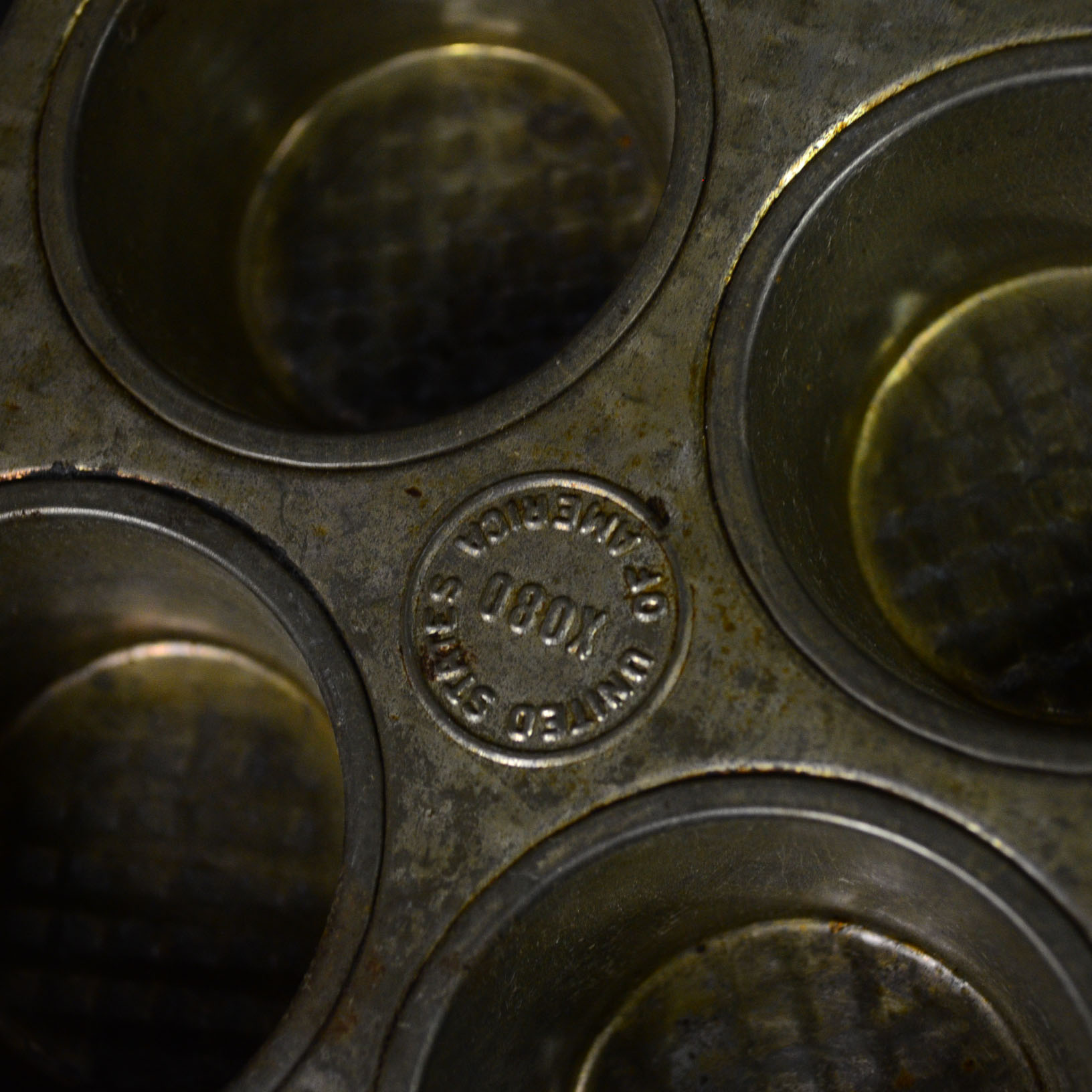 Collection of Wooden Canisters and Vintage Tin Bakeware