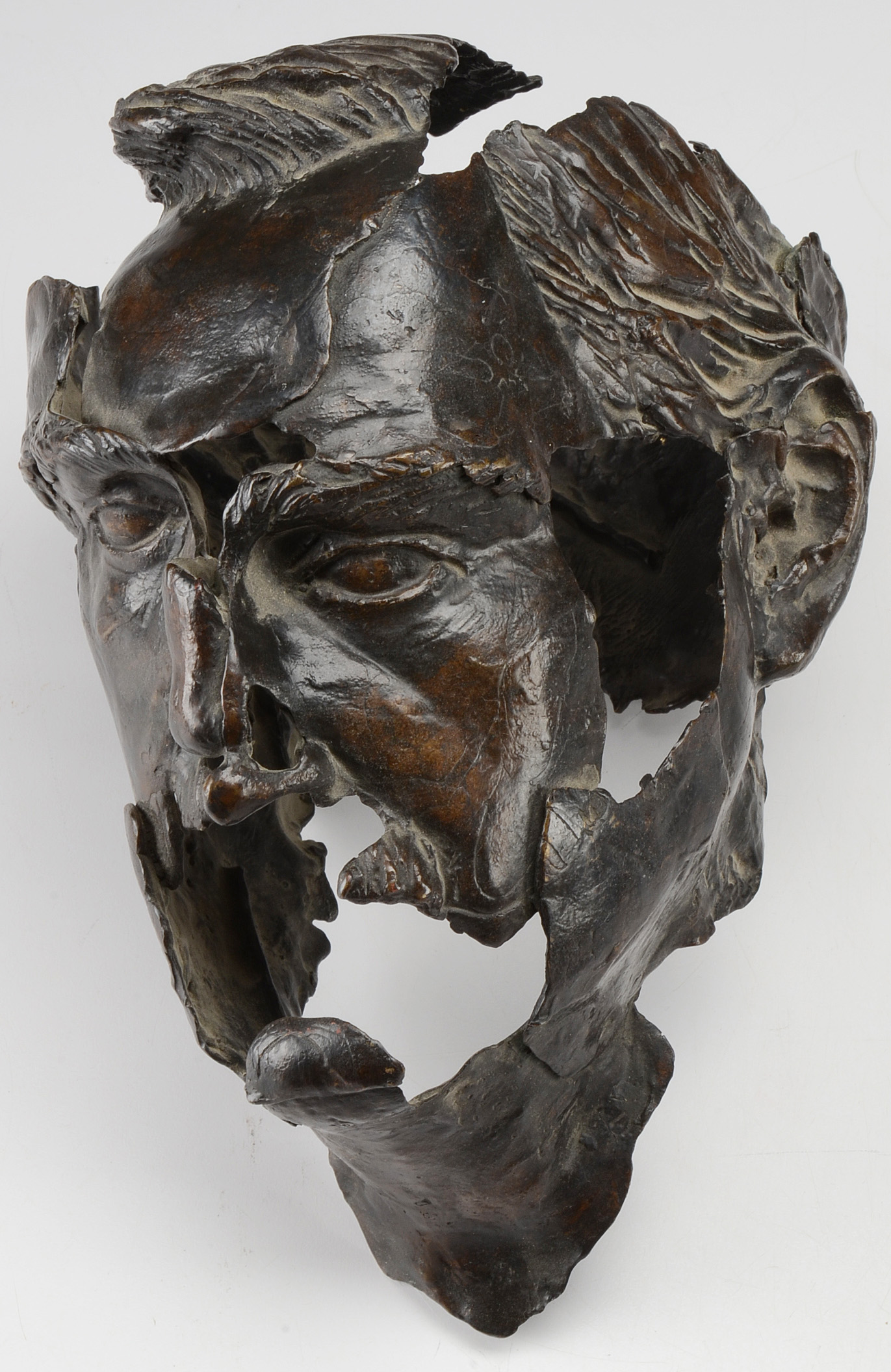 Pair of Metal Head Sculptures