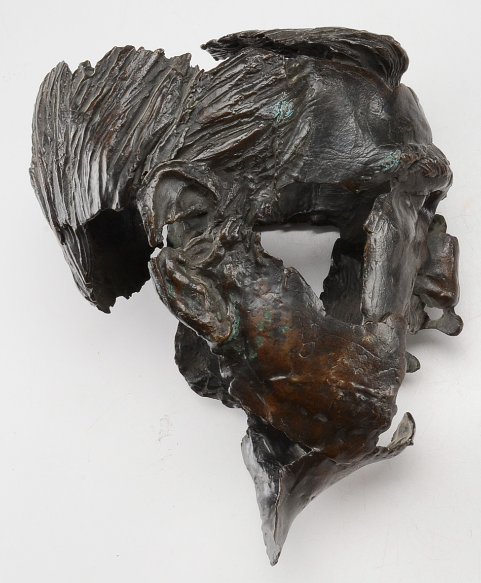 Pair of Metal Head Sculptures