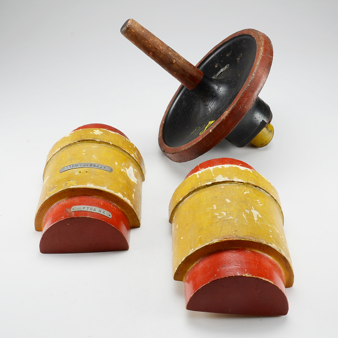 Two Painted Wood Industrial Molds
