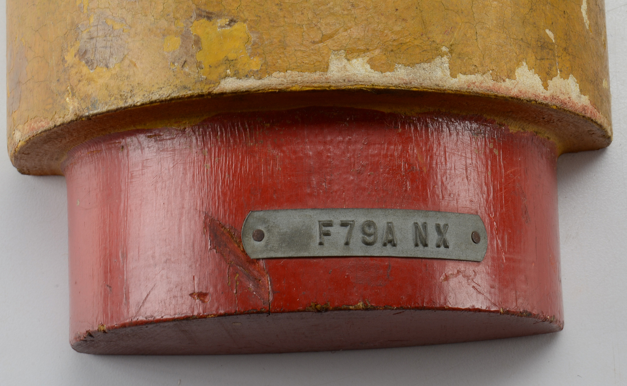 Two Painted Wood Industrial Molds