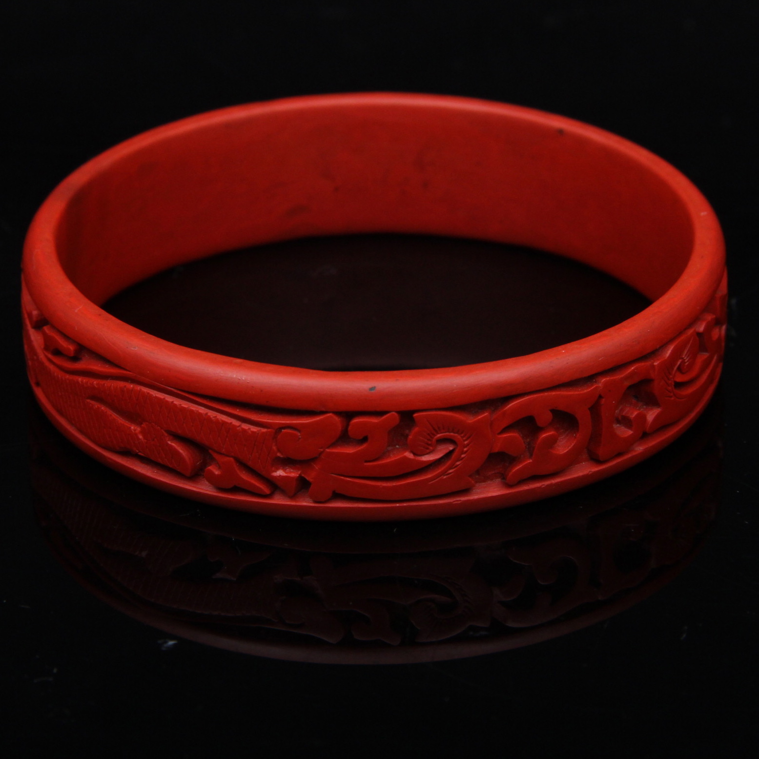Pair of Carved Cinnabar Bangles and Earrings