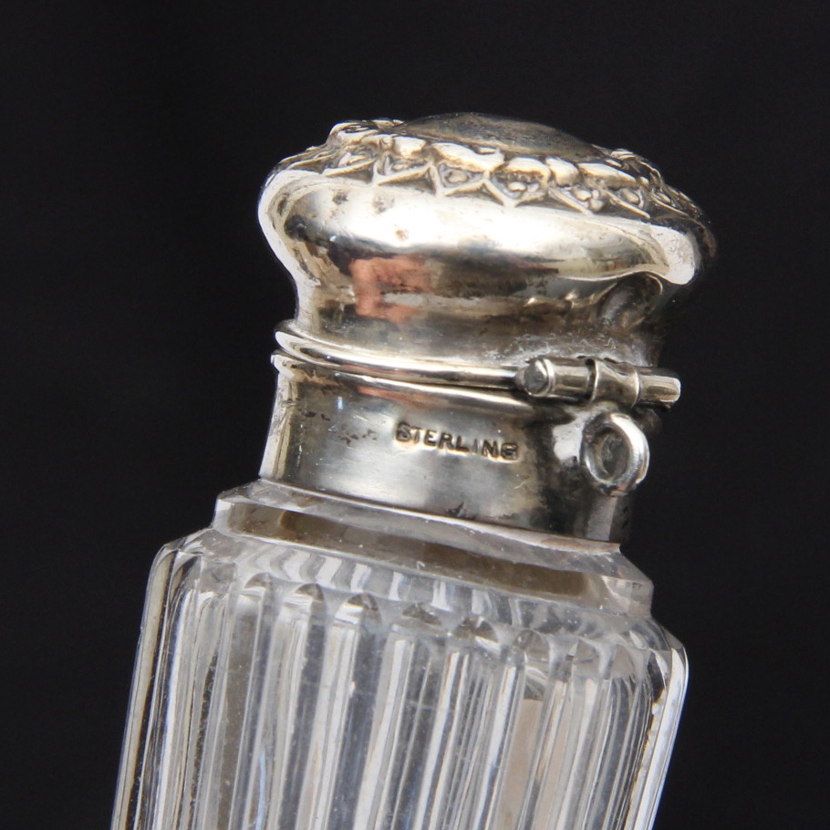 Two Antique Crystal Perfume Bottle with Sterling Lids