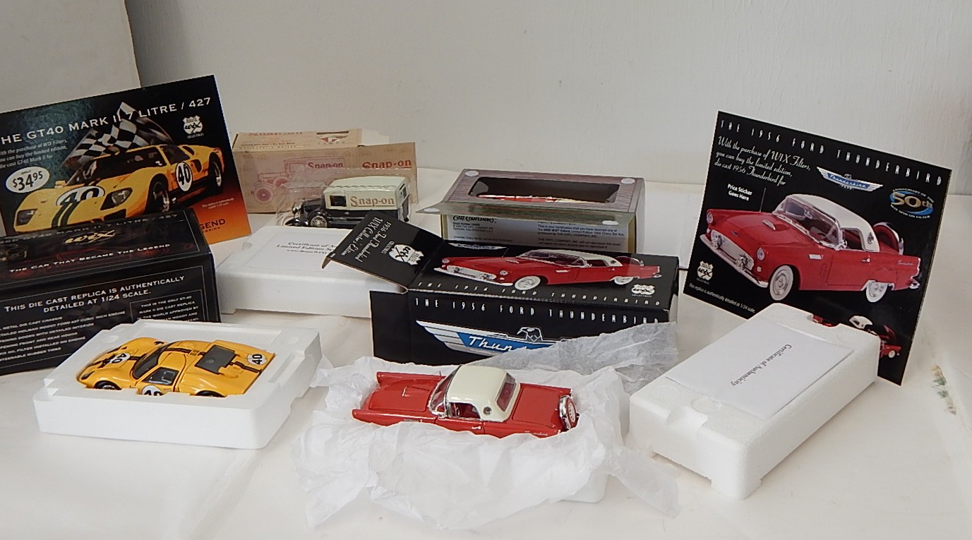 Four Collectible DieCast Cars