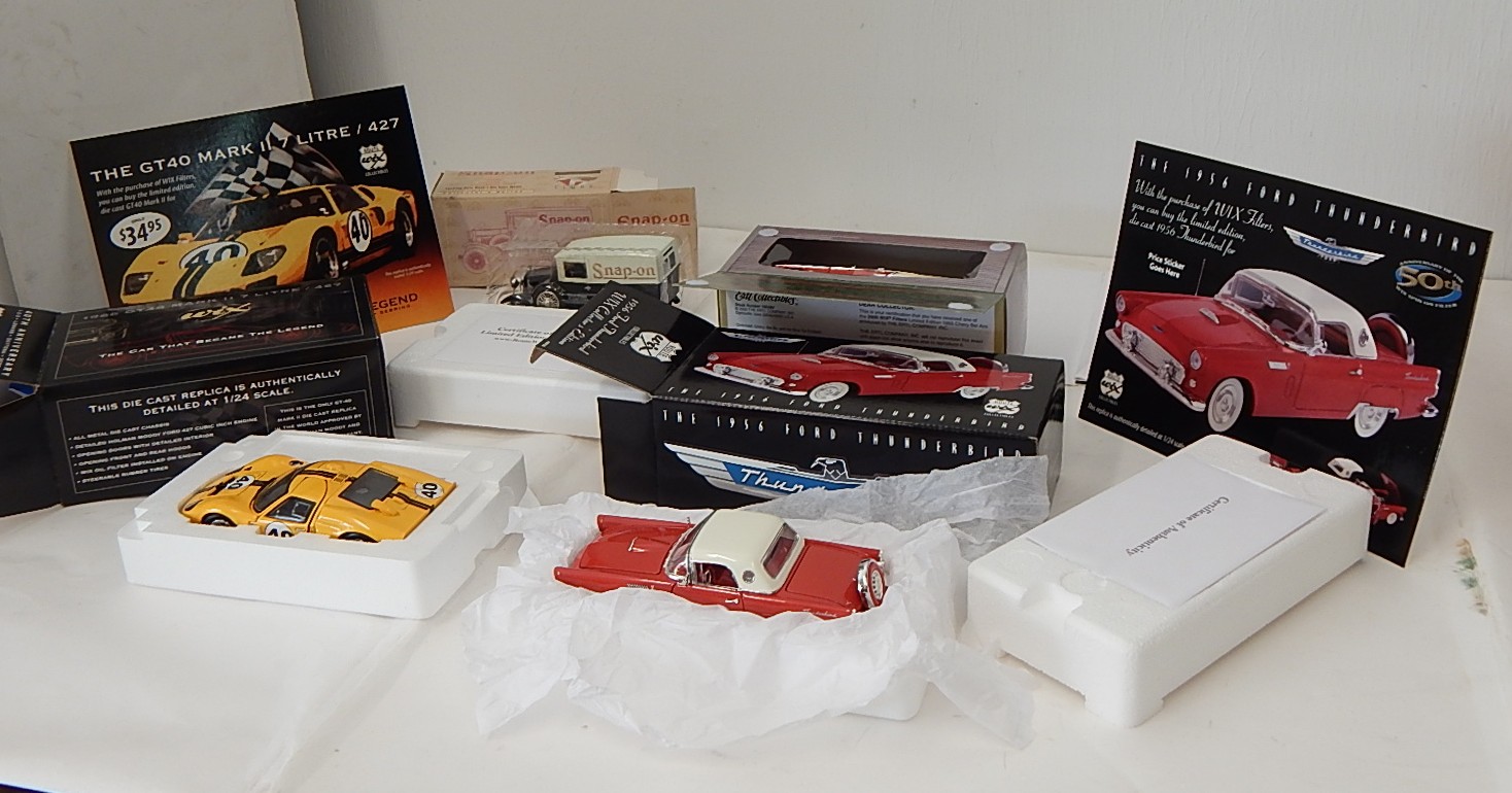 Four Collectible DieCast Cars