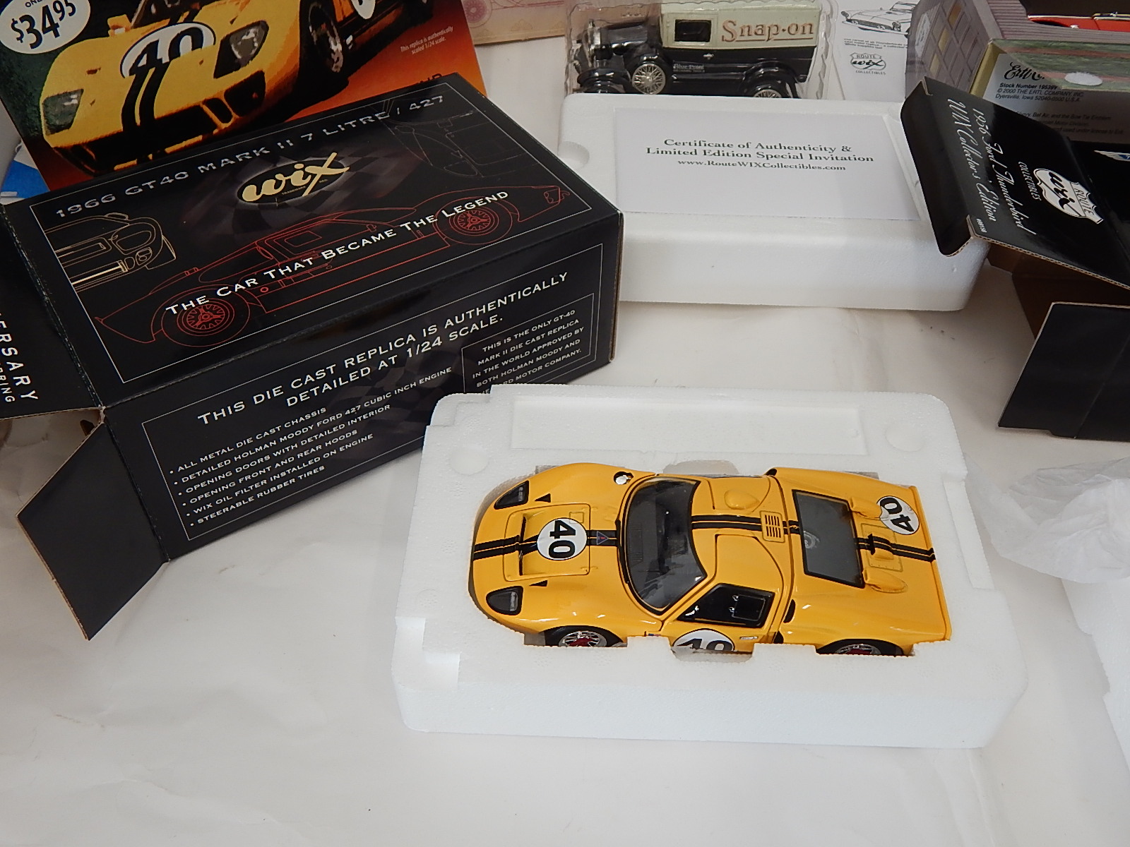 Four Collectible DieCast Cars