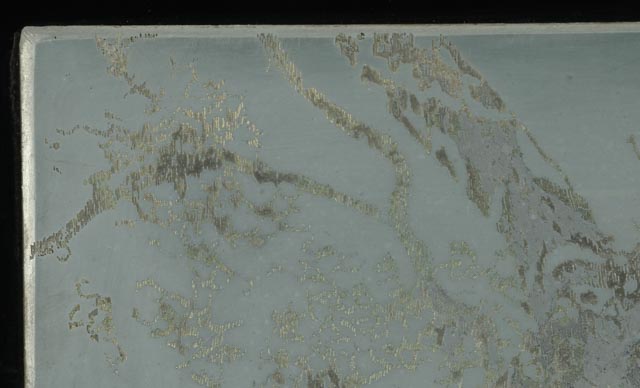 Collaged Steel Intaglio Plates and Faux Wood Veneer on Black Acrylic Substrate