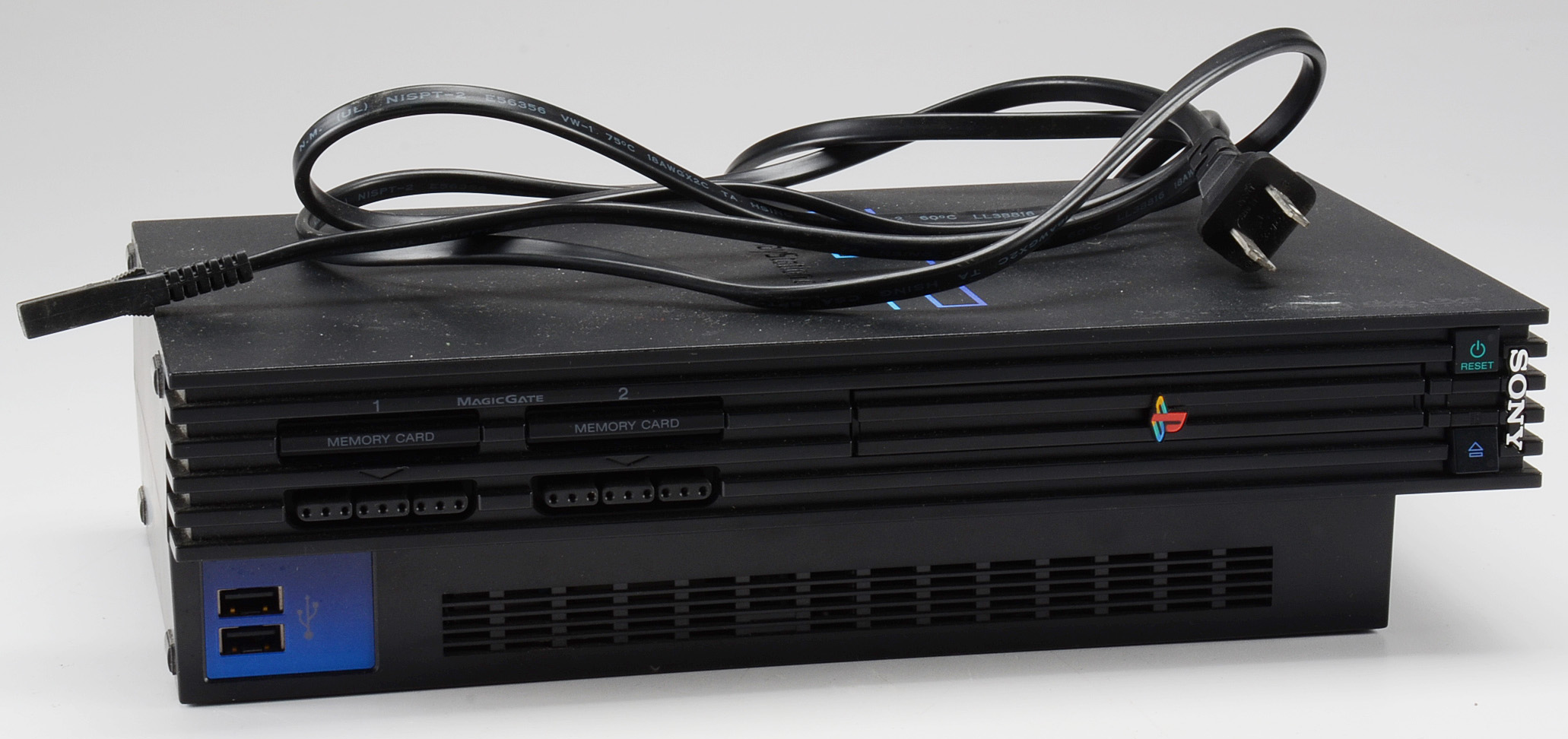 Sony PlayStation 2, Two Controllers, Twenty-Five Games