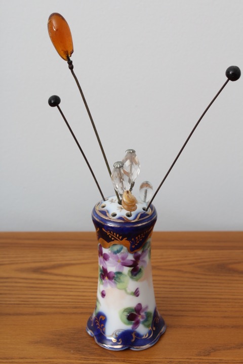 Collection of Hat Pins with Ceramic Hat Pin Holders