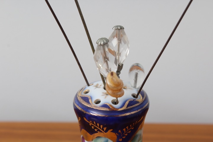 Collection of Hat Pins with Ceramic Hat Pin Holders