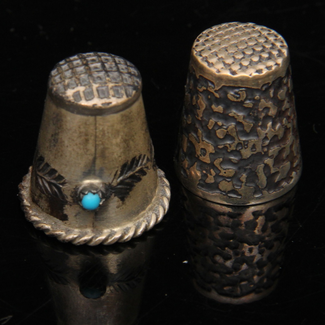 Four Sterling Silver Thimbles