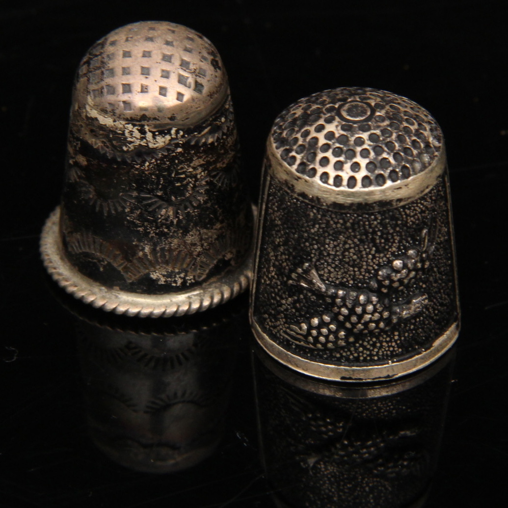 Four Sterling Silver Thimbles
