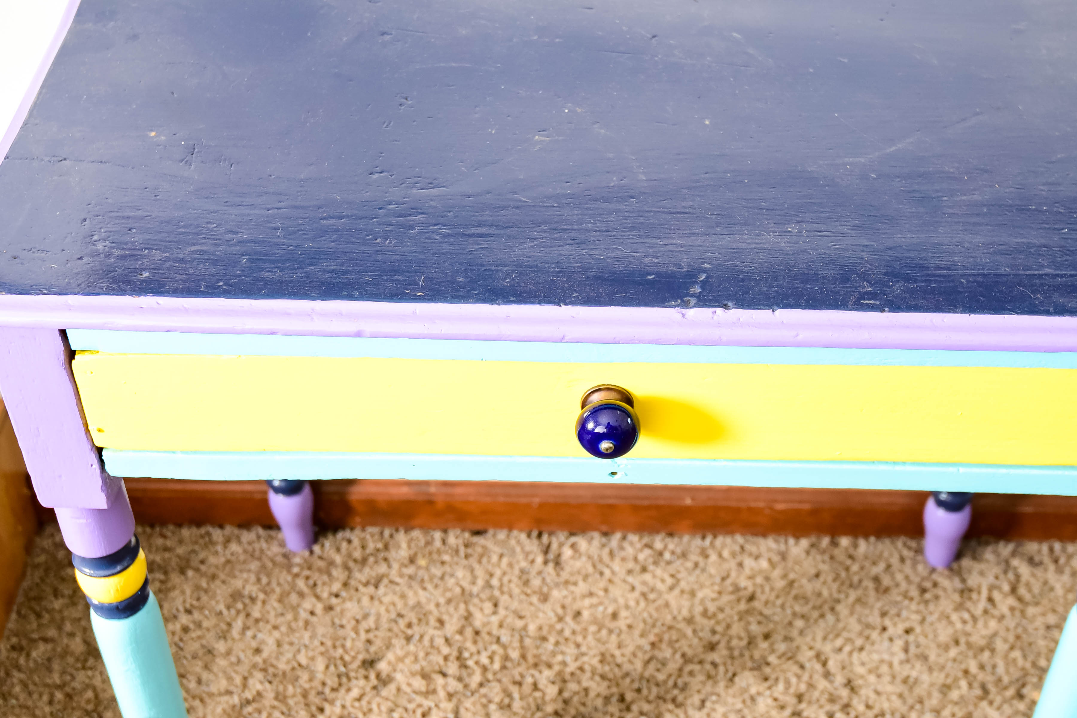 Two Multicolored Side Tables