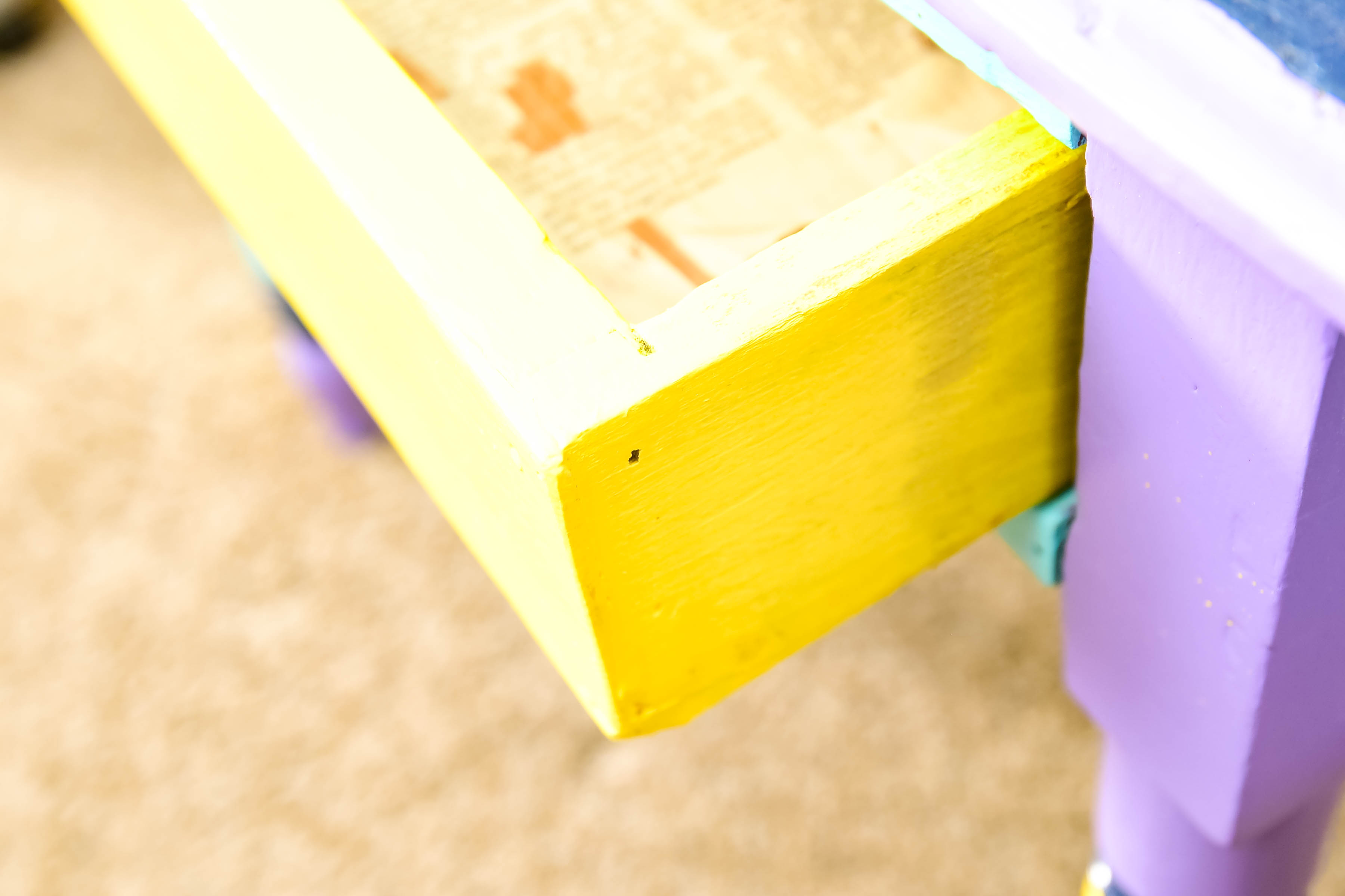 Two Multicolored Side Tables