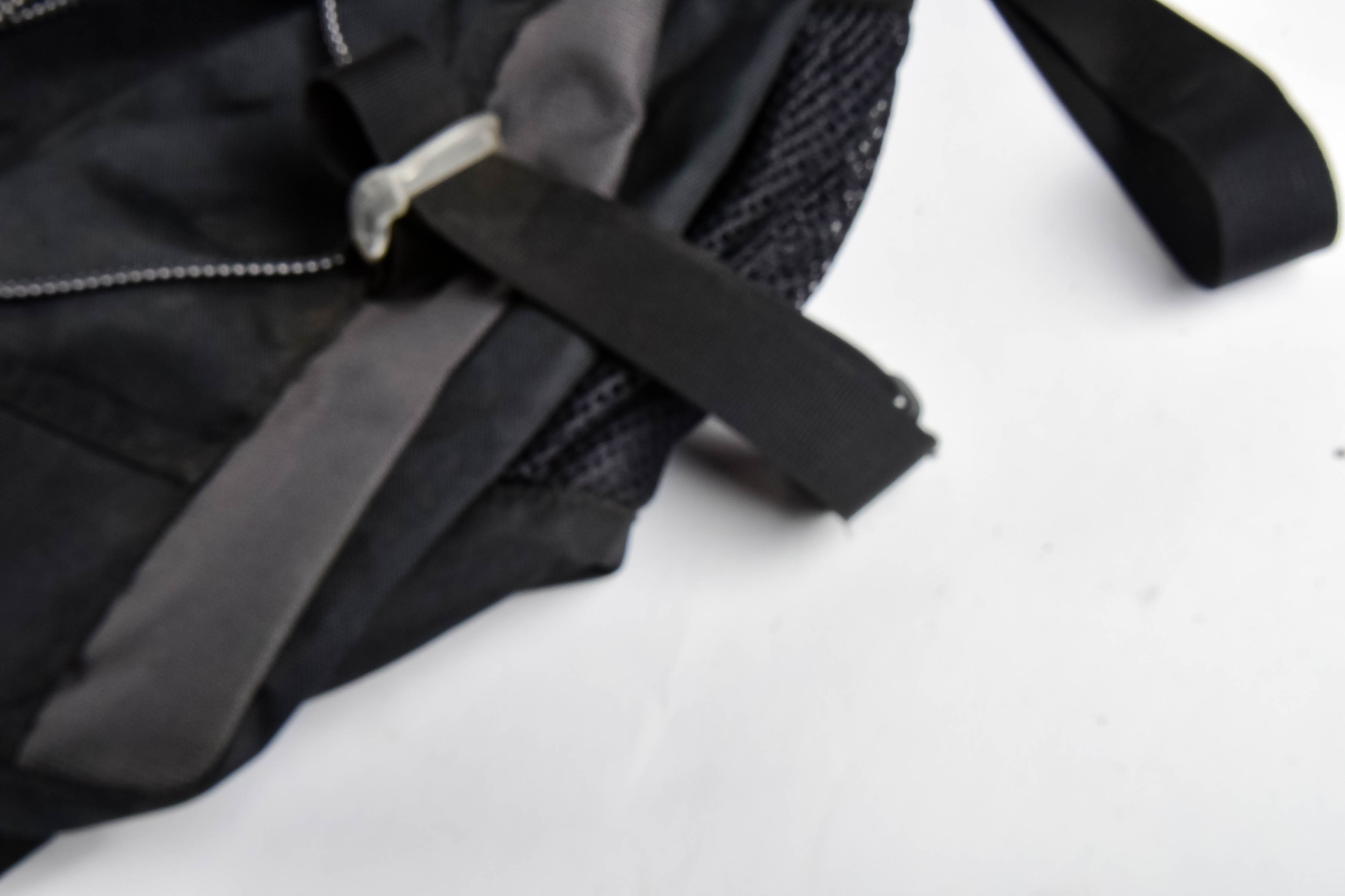 Four Black and Red Backpacks Including Trek