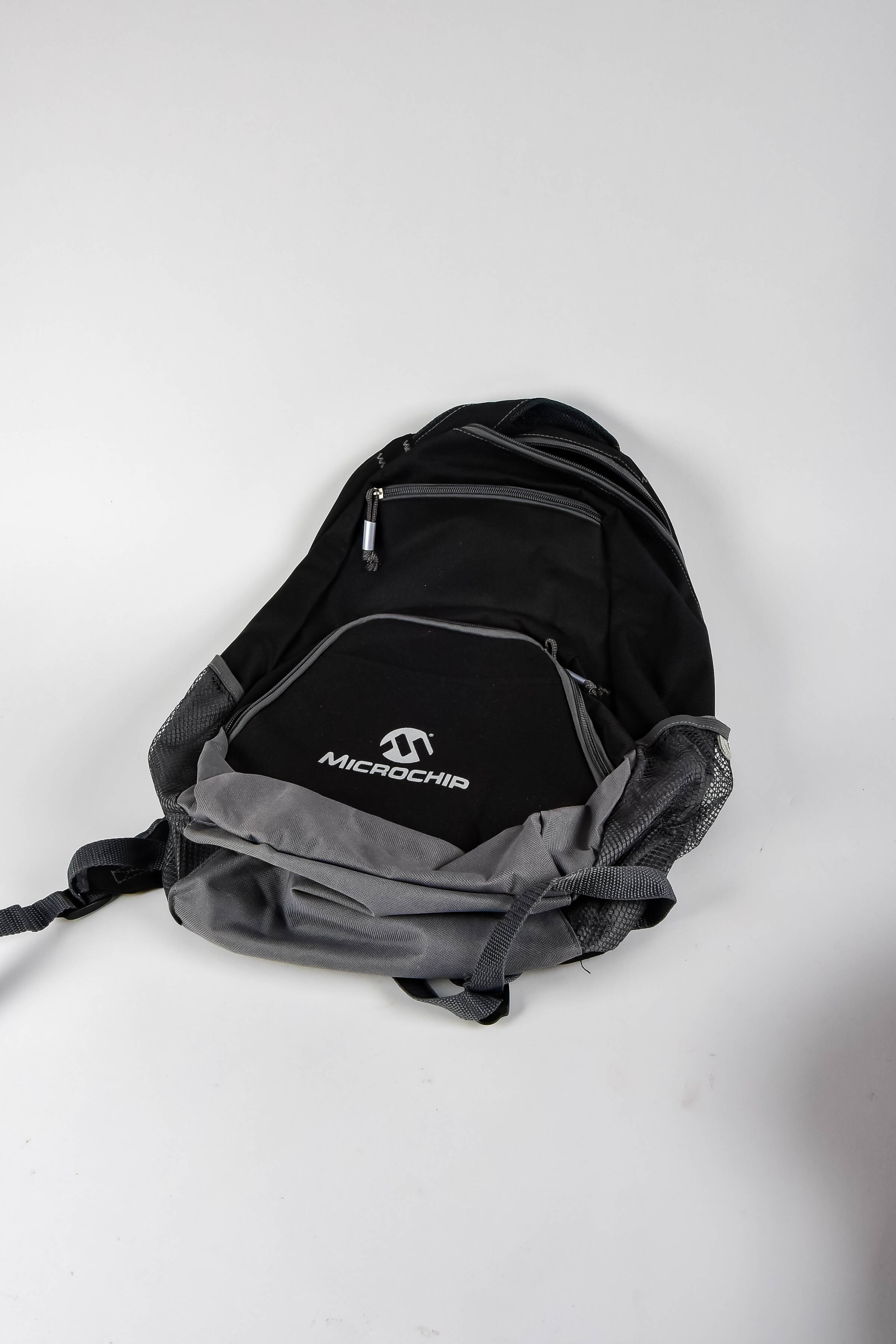 Four Black and Red Backpacks Including Trek