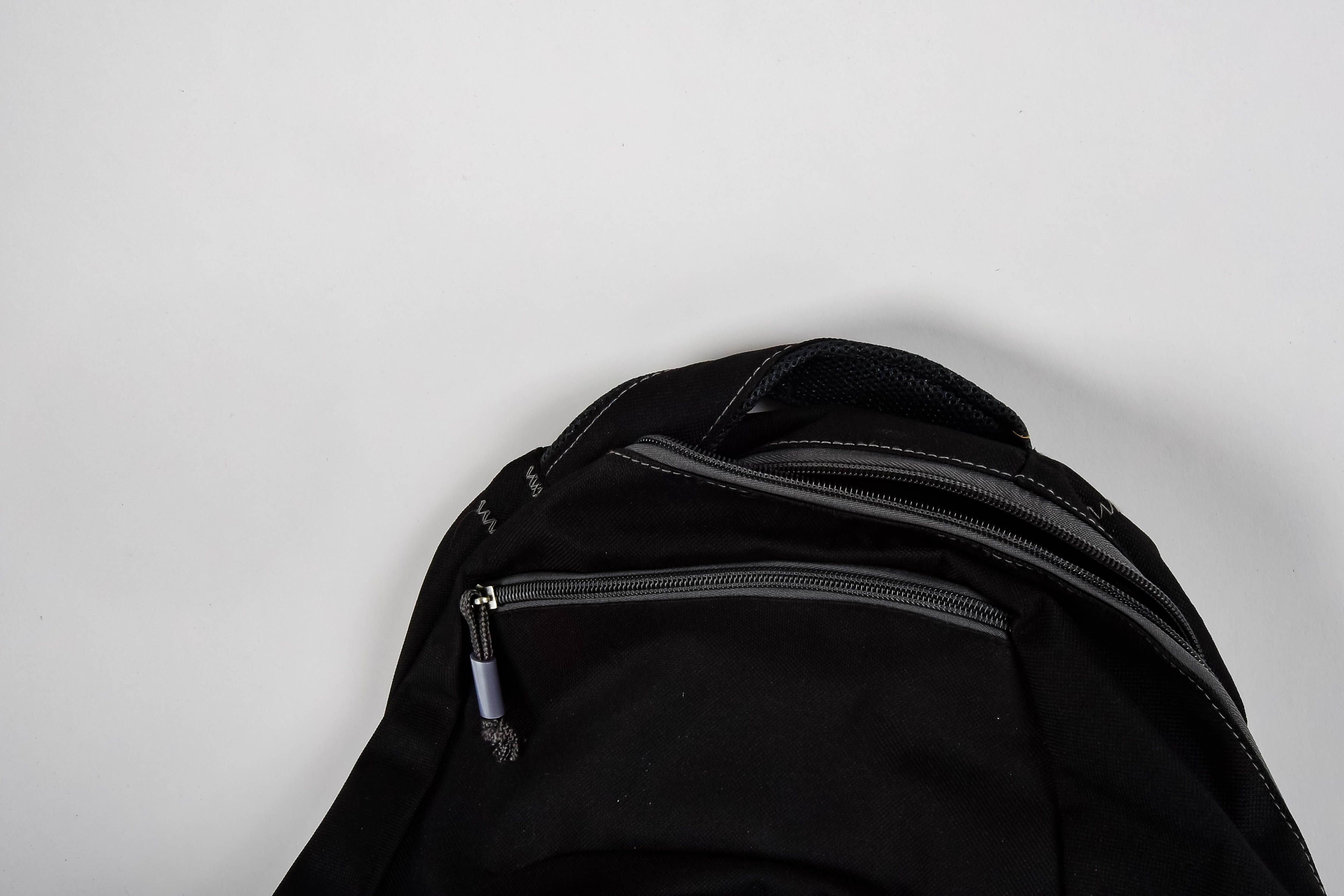 Four Black and Red Backpacks Including Trek