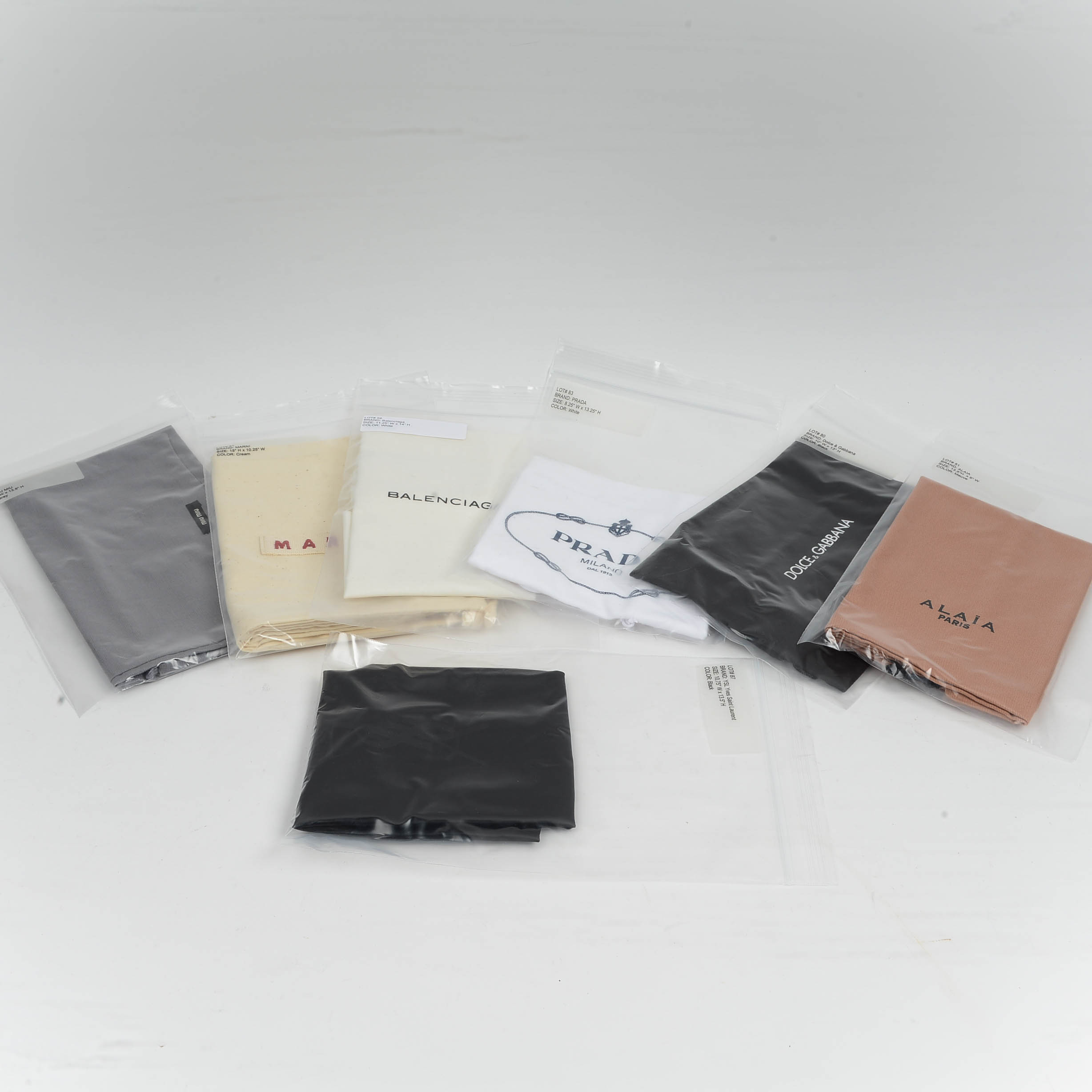 Collection of Seven Designer Dust Bag Covers