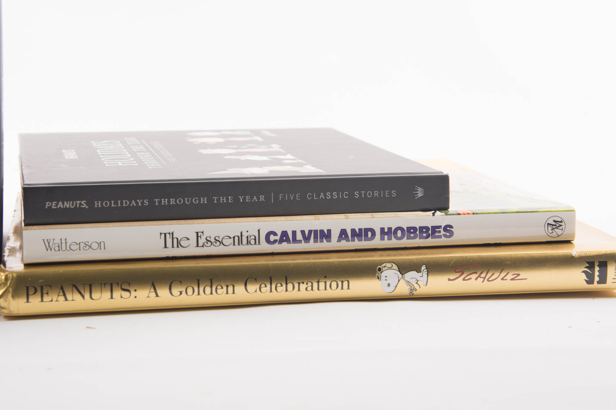 Collection of Comic Strip Books Featuring Peanuts