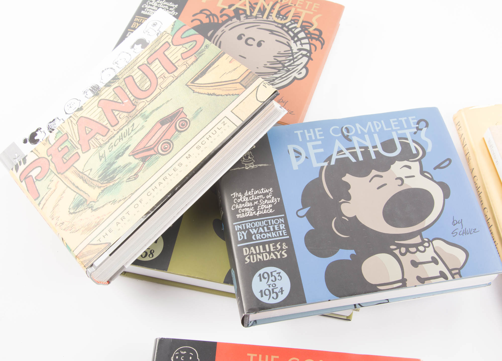 Collection of Comic Strip Books Featuring Peanuts