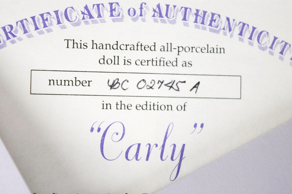 Collectible Ashton-Drake Galleries "Carly" Porcelain Doll, New in Original Box