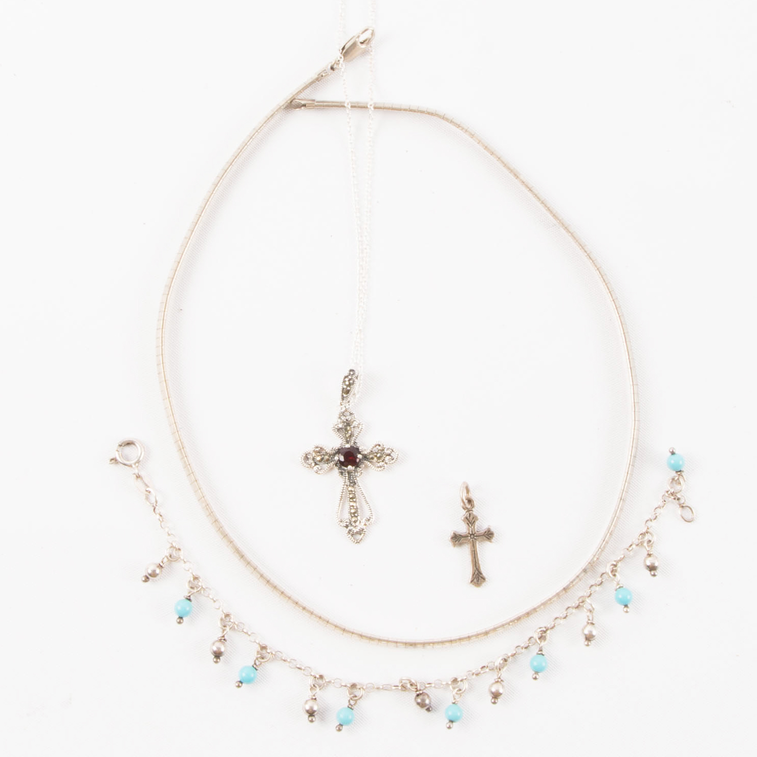 Pair of Sterling Silver Pendants and a Turquoise Bracelet